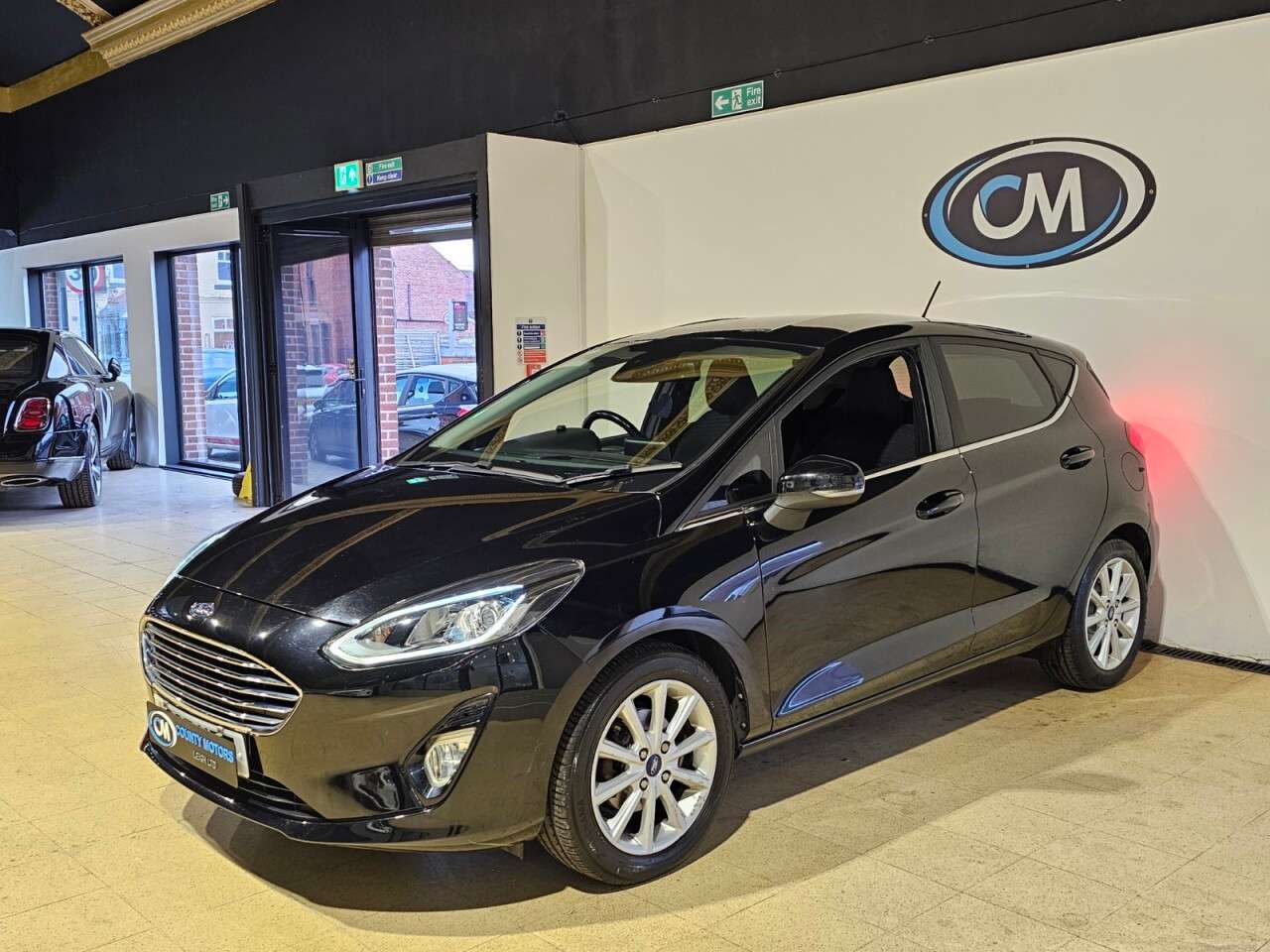 A 2017 FORD FIESTA 1.0T EcoBoost Titanium Hatchback 5dr Petrol Manual Euro 6 (s/s) (125 ps) Lo A 2017 FORD FIESTA 1.0T EcoBoost Titanium Hatchback 5dr Petrol Manual Euro 6 (s/s) (125 ps) Lo