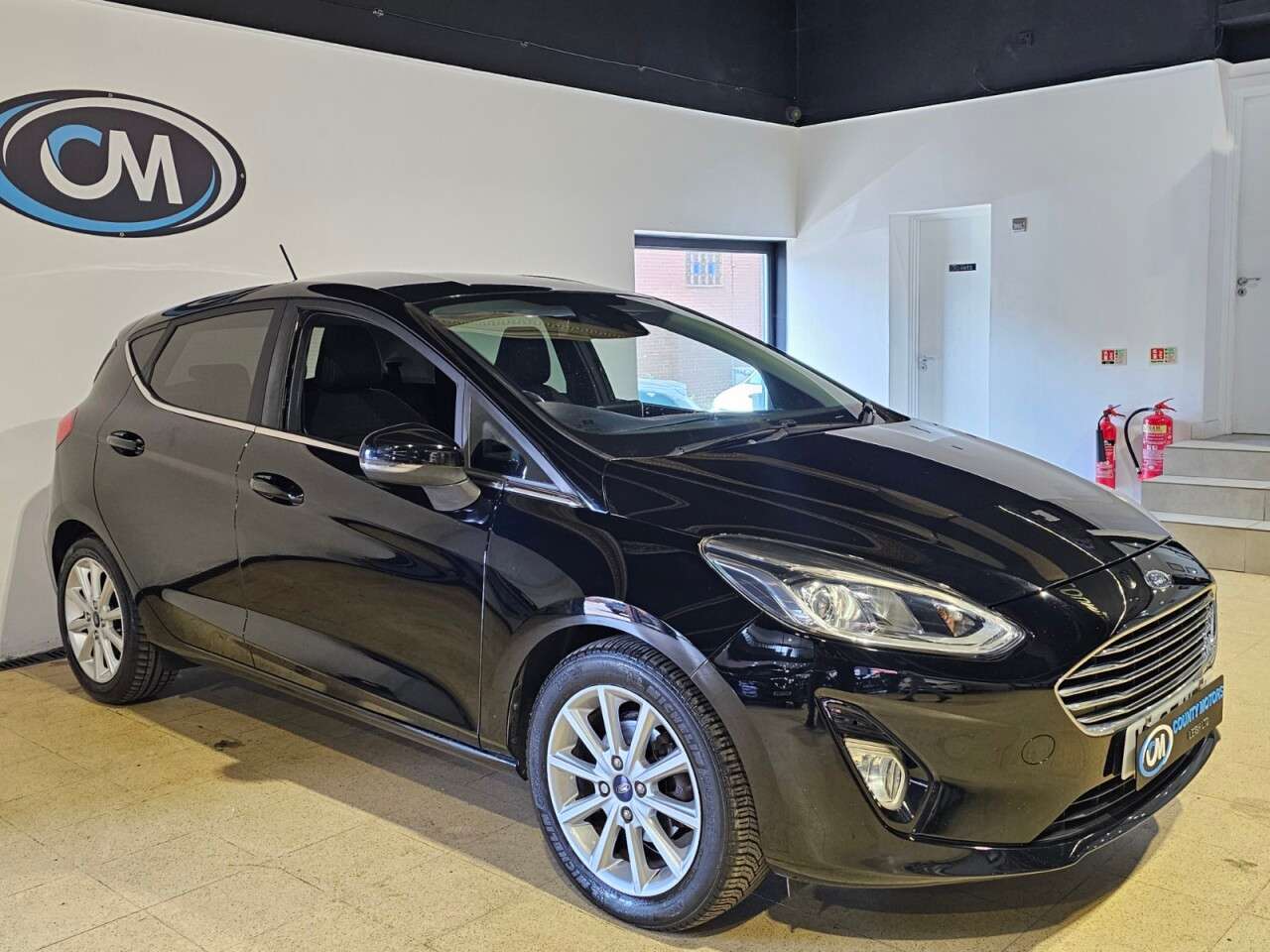 A 2018 FORD FIESTA 1.0T EcoBoost Titanium Hatchback 5dr Petrol Manual Euro 6 (s/s) (125 ps) Lo A 2018 FORD FIESTA 1.0T EcoBoost Titanium Hatchback 5dr Petrol Manual Euro 6 (s/s) (125 ps) Lo
