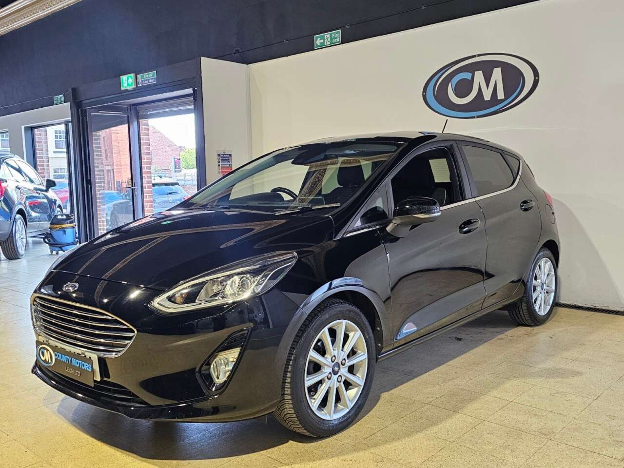 A 2018 FORD FIESTA 1.0T EcoBoost Titanium Hatchback 5dr Petrol Manual Euro 6 (s/s) (125 ps) Lo A 2018 FORD FIESTA 1.0T EcoBoost Titanium Hatchback 5dr Petrol Manual Euro 6 (s/s) (125 ps) Lo