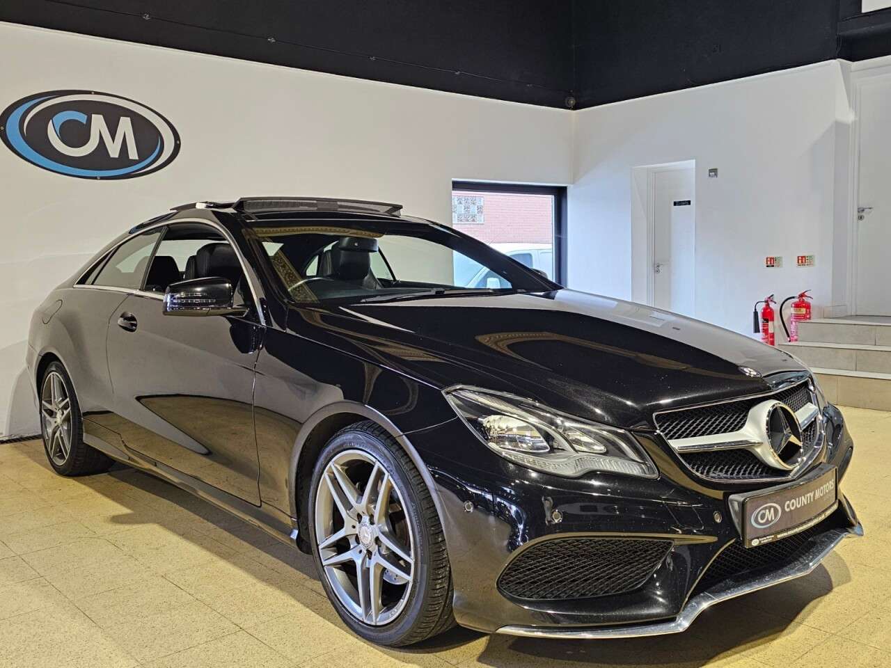 A 2014 MERCEDES-BENZ E CLASS 2.1 E250 CDI AMG Sport Coupe 2dr Diesel G-Tronic+ Euro 5 (s/s) (204 ps) Sli A 2014 MERCEDES-BENZ E CLASS 2.1 E250 CDI AMG Sport Coupe 2dr Diesel G-Tronic+ Euro 5 (s/s) (204 ps) Sli