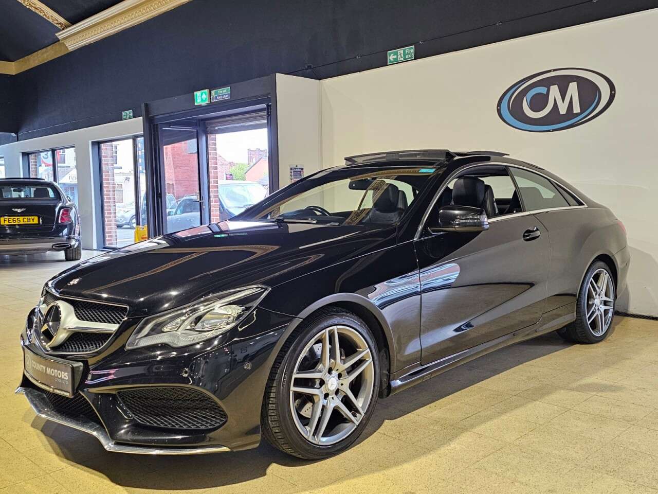 A 2014 MERCEDES-BENZ E CLASS 2.1 E250 CDI AMG Sport Coupe 2dr Diesel G-Tronic+ Euro 5 (s/s) (204 ps) Sli A 2014 MERCEDES-BENZ E CLASS 2.1 E250 CDI AMG Sport Coupe 2dr Diesel G-Tronic+ Euro 5 (s/s) (204 ps) Sli