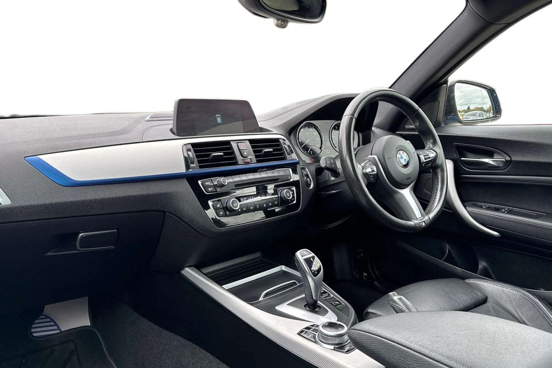 A 2019 BMW 1 SERIES M140i Shadow Edition 3dr Step Auto [ Park Distance Control (PDC), front and rear , Seat heating for driver and front passenger , Cruise control with b A 2019 BMW 1 SERIES M140i Shadow Edition 3dr Step Auto [ Park Distance Control (PDC), front and rear , Seat heating for driver and front passenger , Cruise control with b