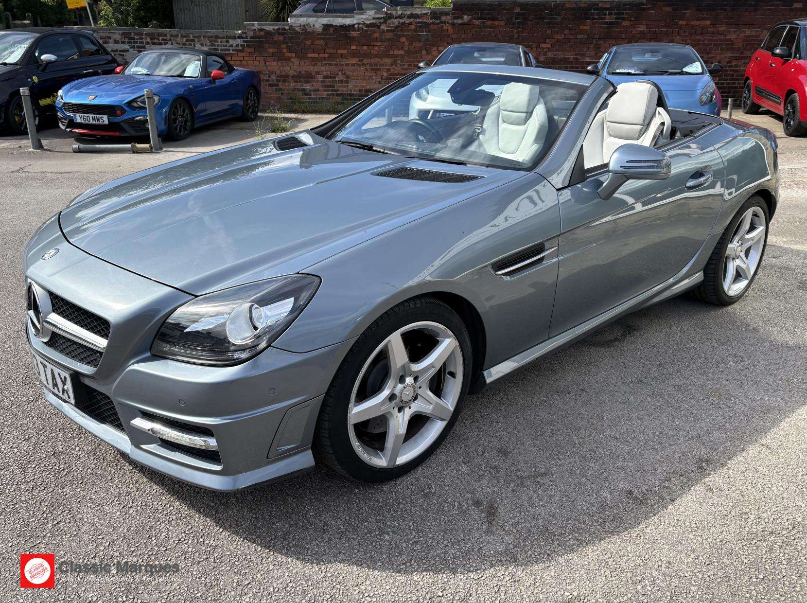A 2012 MERCEDES-BENZ SLK 1.8 SLK200 BlueEfficiency AMG Sport Convertible 2dr Petrol G-Tronic+ Euro 5 (s/s) (184 ps) A 2012 MERCEDES-BENZ SLK 1.8 SLK200 BlueEfficiency AMG Sport Convertible 2dr Petrol G-Tronic+ Euro 5 (s/s) (184 ps)
