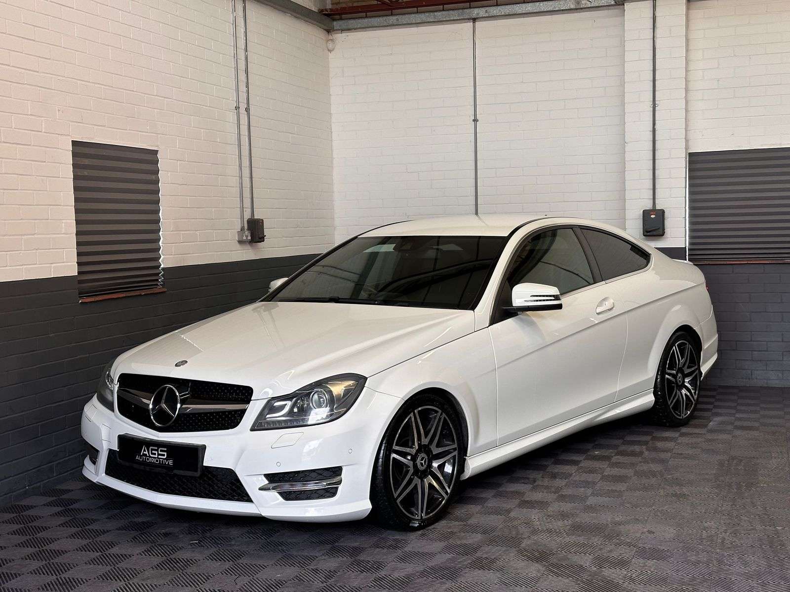 A 2013 MERCEDES-BENZ C CLASS 2.1 C220 CDI BlueEfficiency AMG Sport Plus Coupe 2dr Diesel G-Tronic+ Euro 5 (s/s) (170 ps) A 2013 MERCEDES-BENZ C CLASS 2.1 C220 CDI BlueEfficiency AMG Sport Plus Coupe 2dr Diesel G-Tronic+ Euro 5 (s/s) (170 ps)