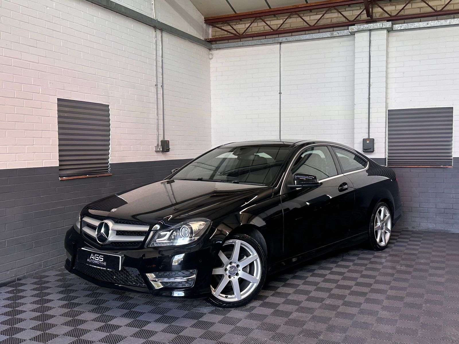A 2014 MERCEDES-BENZ C CLASS 2.1 C220 CDI AMG Sport Edition Coupe 2dr Diesel G-Tronic+ Euro 5 (s/s) (170 ps) A 2014 MERCEDES-BENZ C CLASS 2.1 C220 CDI AMG Sport Edition Coupe 2dr Diesel G-Tronic+ Euro 5 (s/s) (170 ps)