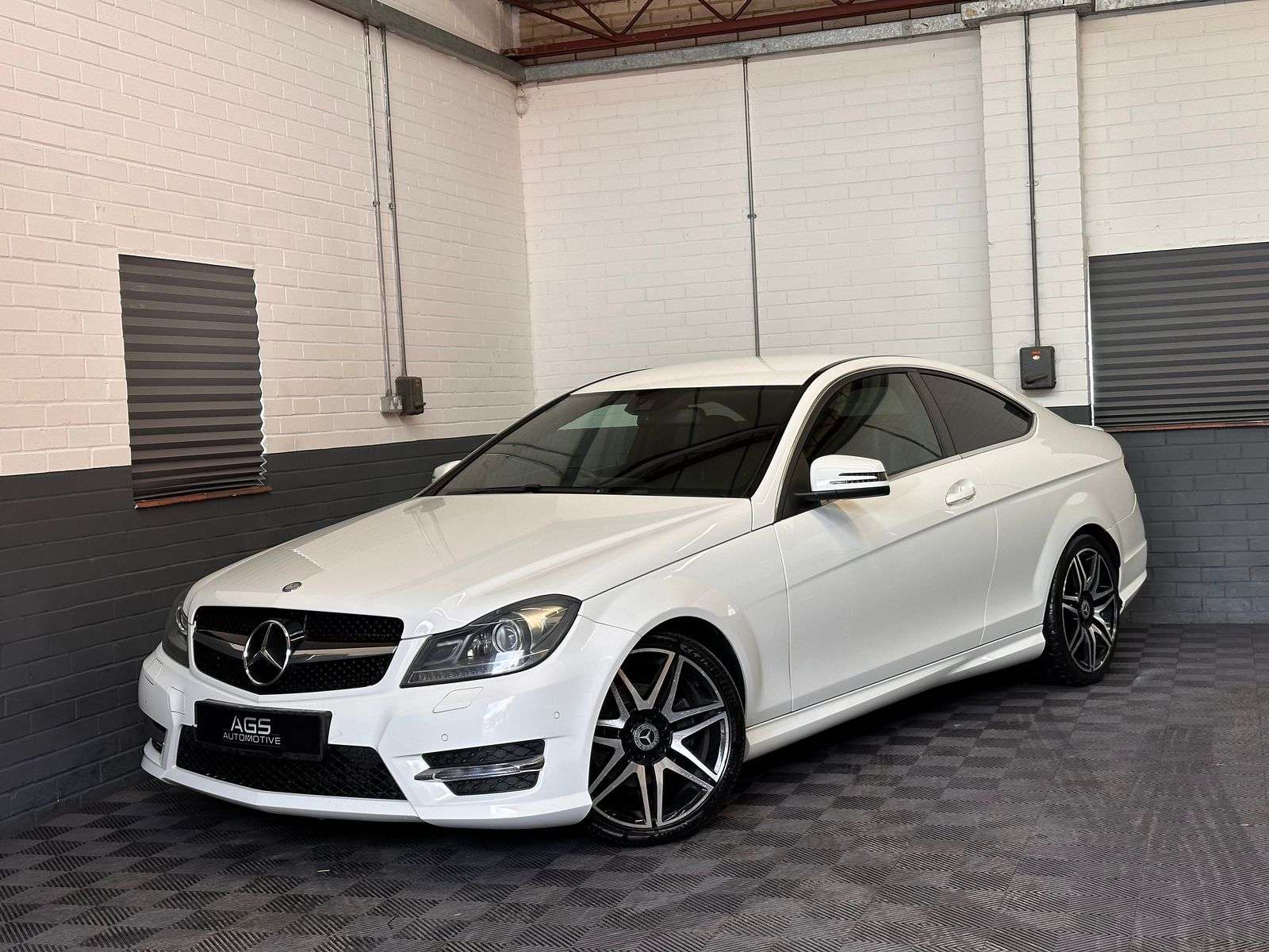 A 2013 MERCEDES-BENZ C CLASS 2.1 C220 CDI BlueEfficiency AMG Sport Plus Coupe 2dr Diesel G-Tronic+ Euro 5 (s/s) (170 ps) A 2013 MERCEDES-BENZ C CLASS 2.1 C220 CDI BlueEfficiency AMG Sport Plus Coupe 2dr Diesel G-Tronic+ Euro 5 (s/s) (170 ps)