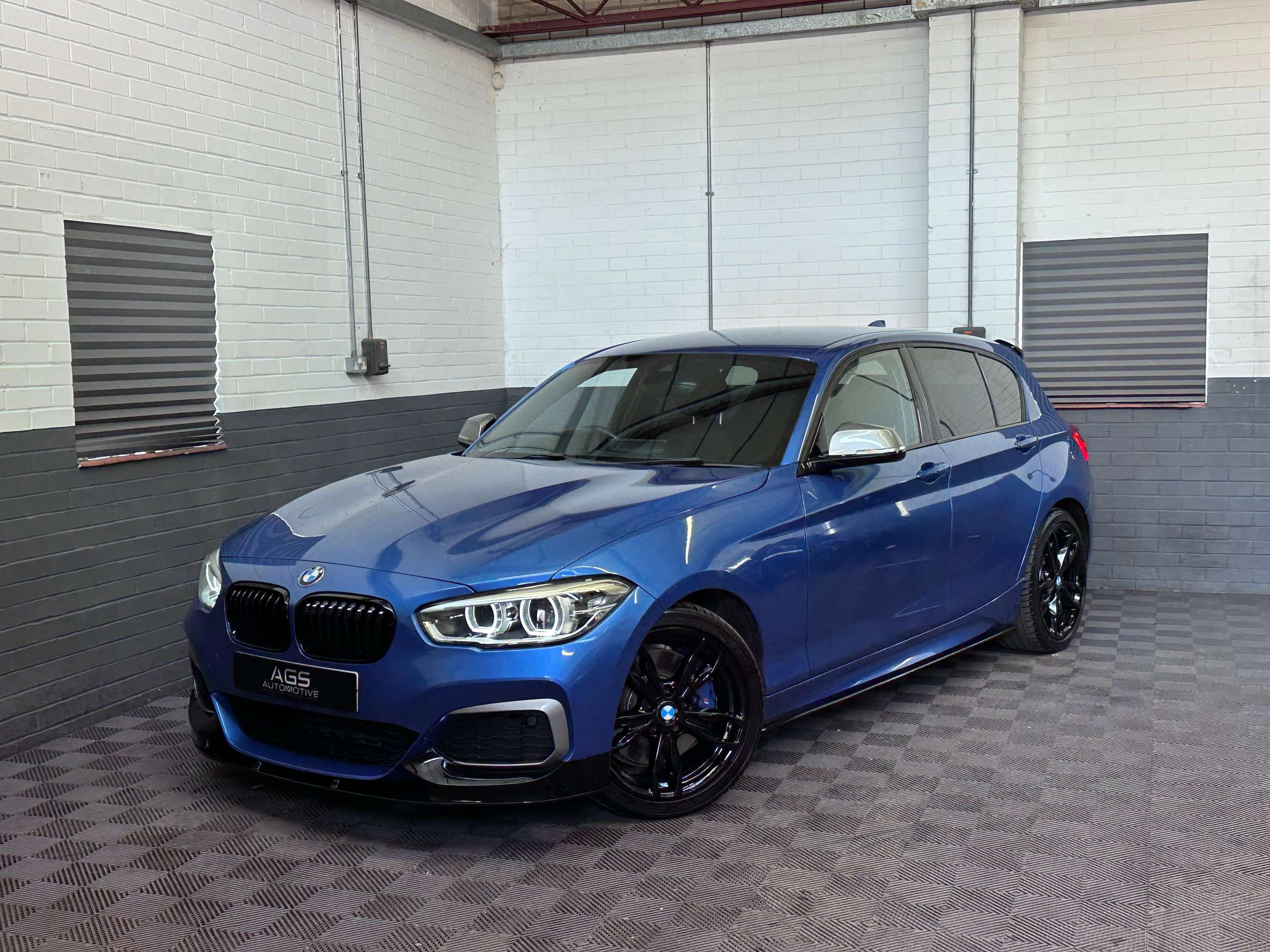 A 2016 BMW 1 SERIES 3.0 M140i Hatchback 5dr Petrol Auto Euro 6 (s/s) (340 ps) A 2016 BMW 1 SERIES 3.0 M140i Hatchback 5dr Petrol Auto Euro 6 (s/s) (340 ps)