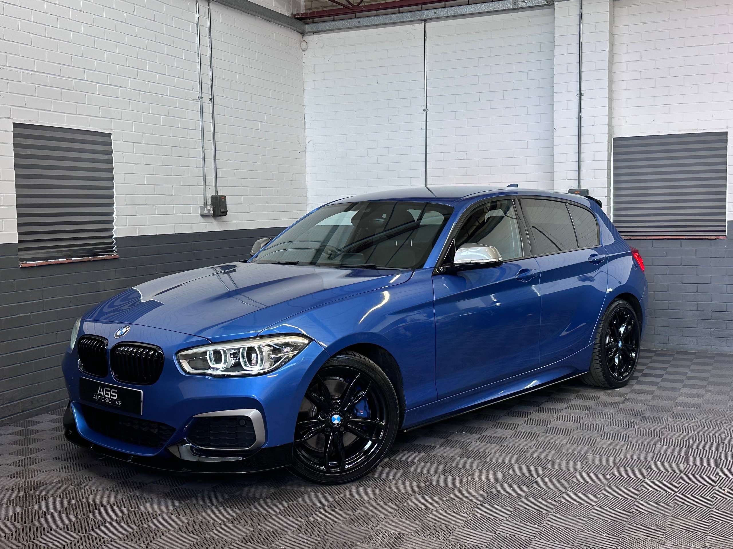 A 2016 BMW 1 SERIES 3.0 M140i Hatchback 5dr Petrol Auto Euro 6 (s/s) (340 ps) A 2016 BMW 1 SERIES 3.0 M140i Hatchback 5dr Petrol Auto Euro 6 (s/s) (340 ps)
