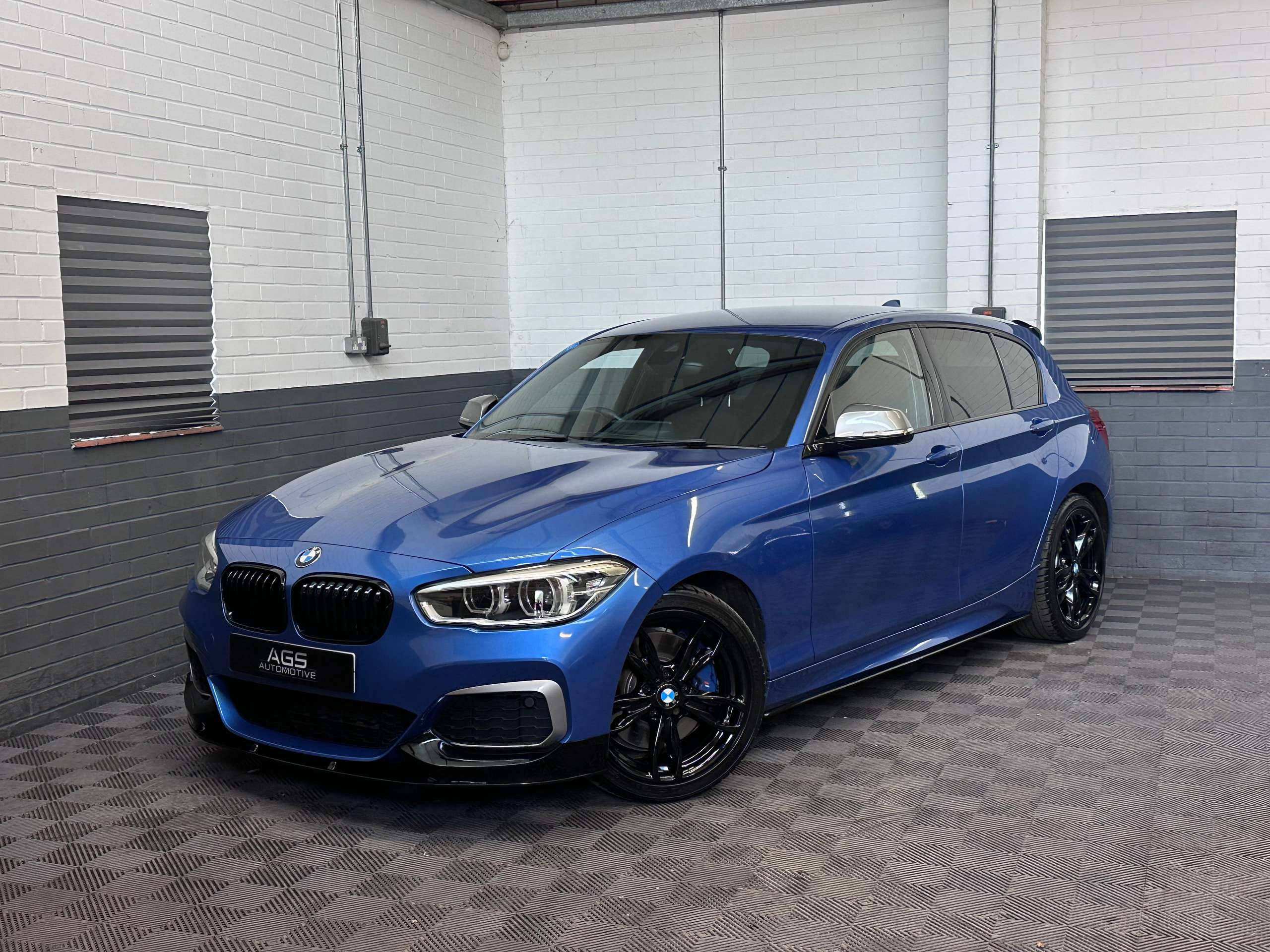 A 2016 BMW 1 SERIES 3.0 M140i Hatchback 5dr Petrol Auto Euro 6 (s/s) (340 ps) A 2016 BMW 1 SERIES 3.0 M140i Hatchback 5dr Petrol Auto Euro 6 (s/s) (340 ps)