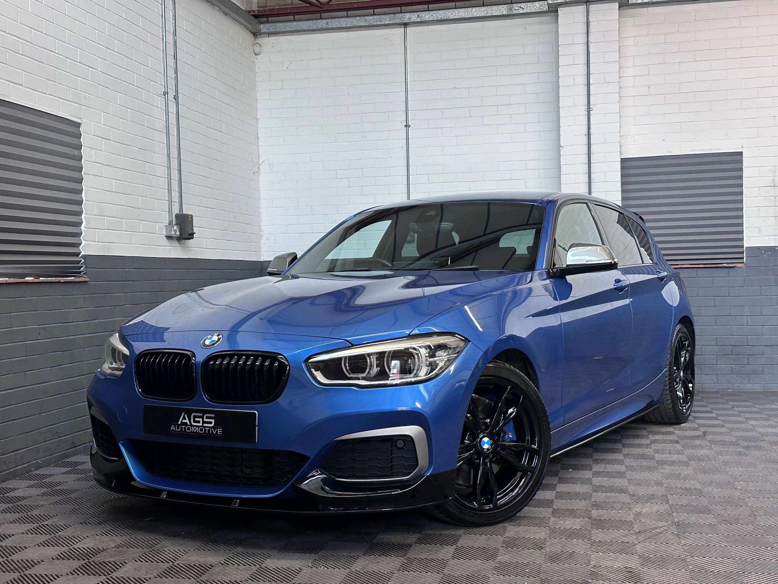 A 2016 BMW 1 SERIES 3.0 M140i Hatchback 5dr Petrol Auto Euro 6 (s/s) (340 ps) A 2016 BMW 1 SERIES 3.0 M140i Hatchback 5dr Petrol Auto Euro 6 (s/s) (340 ps)