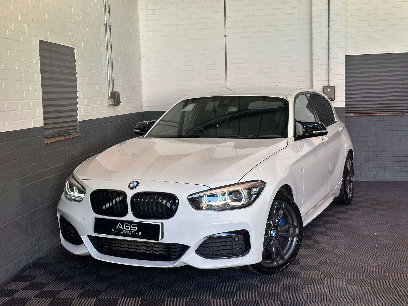 A 2017 BMW 1 SERIES 3.0 M140i Shadow Edition Hatchback 5dr Petrol Auto Euro 6 (s/s) (340 ps) A 2017 BMW 1 SERIES 3.0 M140i Shadow Edition Hatchback 5dr Petrol Auto Euro 6 (s/s) (340 ps)