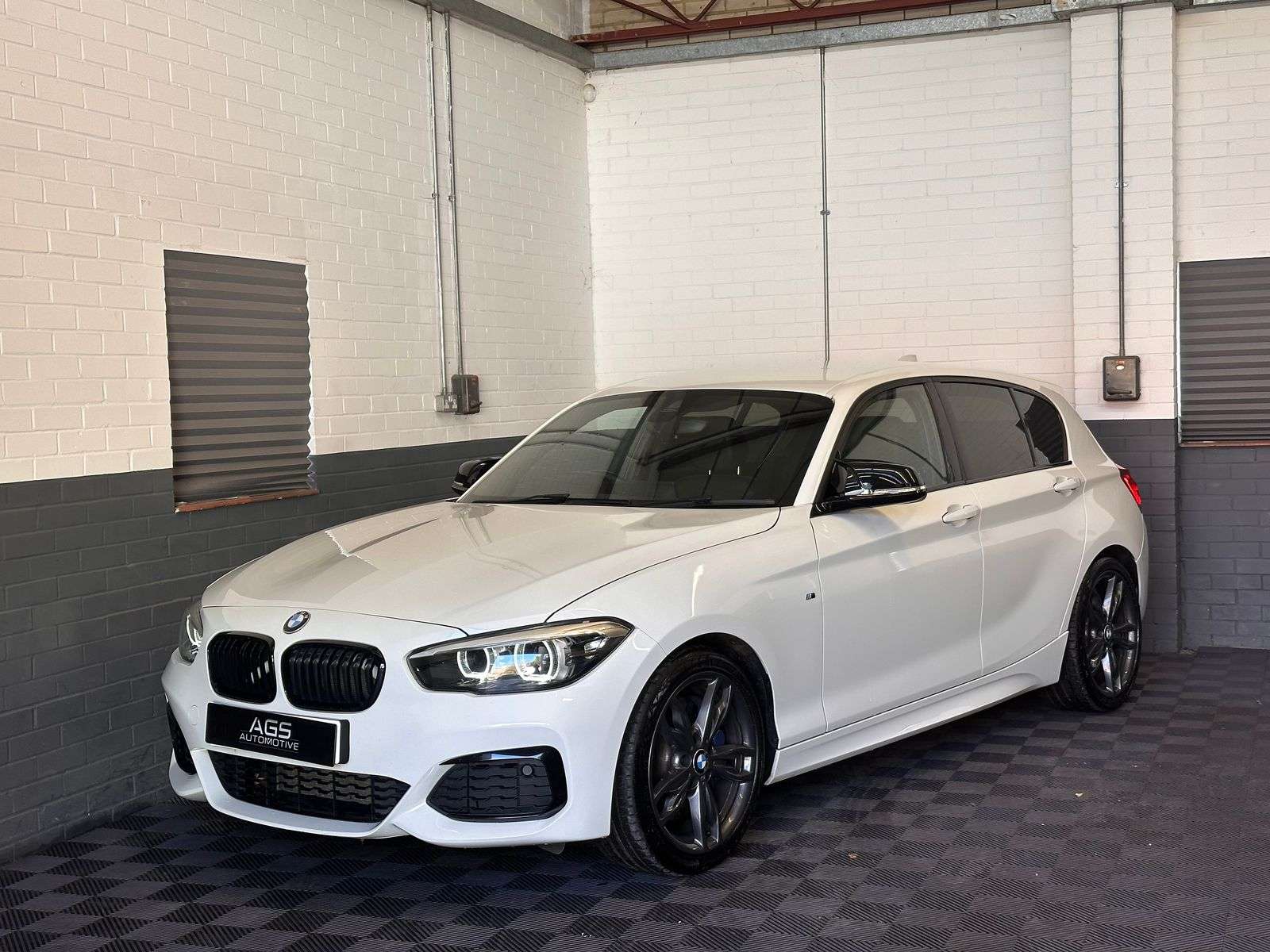 A 2017 BMW 1 SERIES 3.0 M140i Shadow Edition Hatchback 5dr Petrol Auto Euro 6 (s/s) (340 ps) A 2017 BMW 1 SERIES 3.0 M140i Shadow Edition Hatchback 5dr Petrol Auto Euro 6 (s/s) (340 ps)