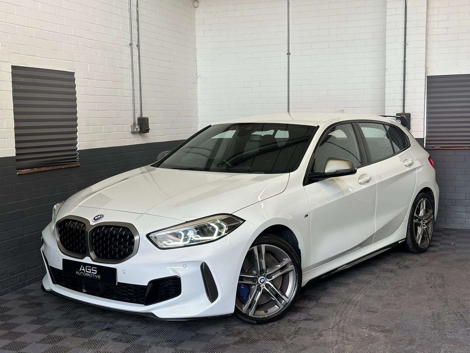 A 2021 BMW 1 SERIES 2.0 M135i Hatchback 5dr Petrol Auto xDrive Euro 6 (s/s) (306 ps) A 2021 BMW 1 SERIES 2.0 M135i Hatchback 5dr Petrol Auto xDrive Euro 6 (s/s) (306 ps)