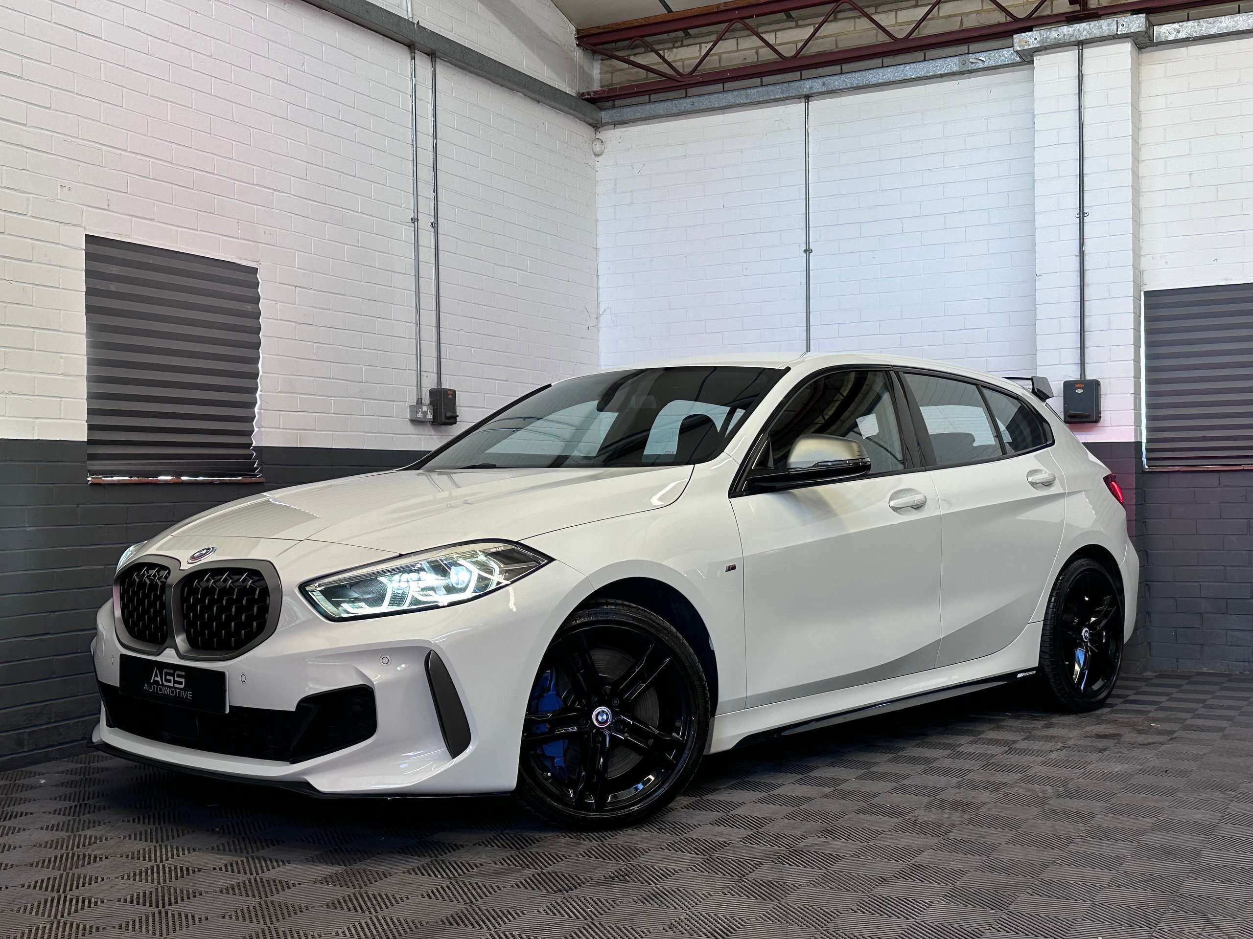 A 2021 BMW 1 SERIES 2.0 M135i Hatchback 5dr Petrol Auto xDrive Euro 6 (s/s) (306 ps) A 2021 BMW 1 SERIES 2.0 M135i Hatchback 5dr Petrol Auto xDrive Euro 6 (s/s) (306 ps)
