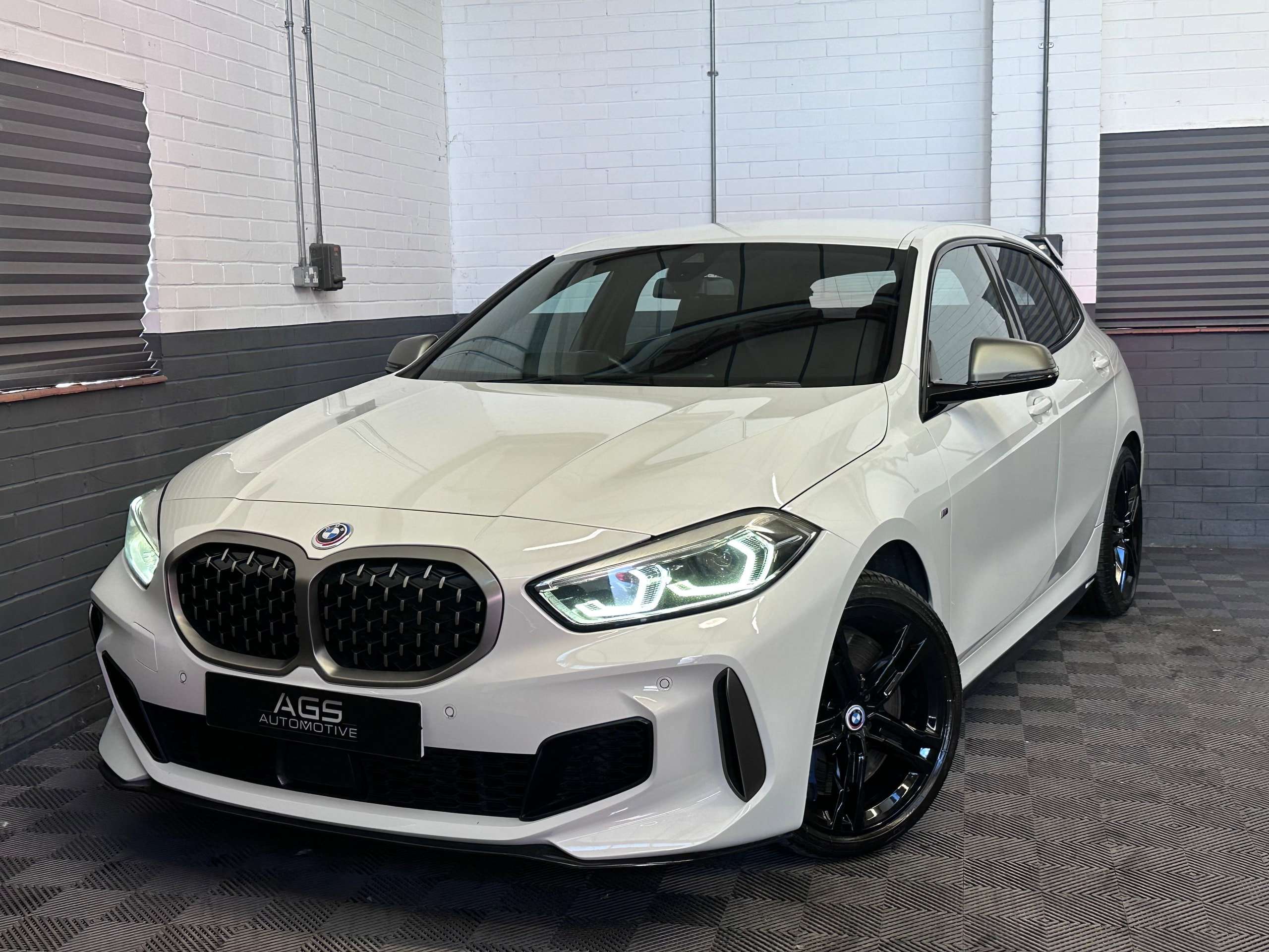 A 2021 BMW 1 SERIES 2.0 M135i Hatchback 5dr Petrol Auto xDrive Euro 6 (s/s) (306 ps) A 2021 BMW 1 SERIES 2.0 M135i Hatchback 5dr Petrol Auto xDrive Euro 6 (s/s) (306 ps)