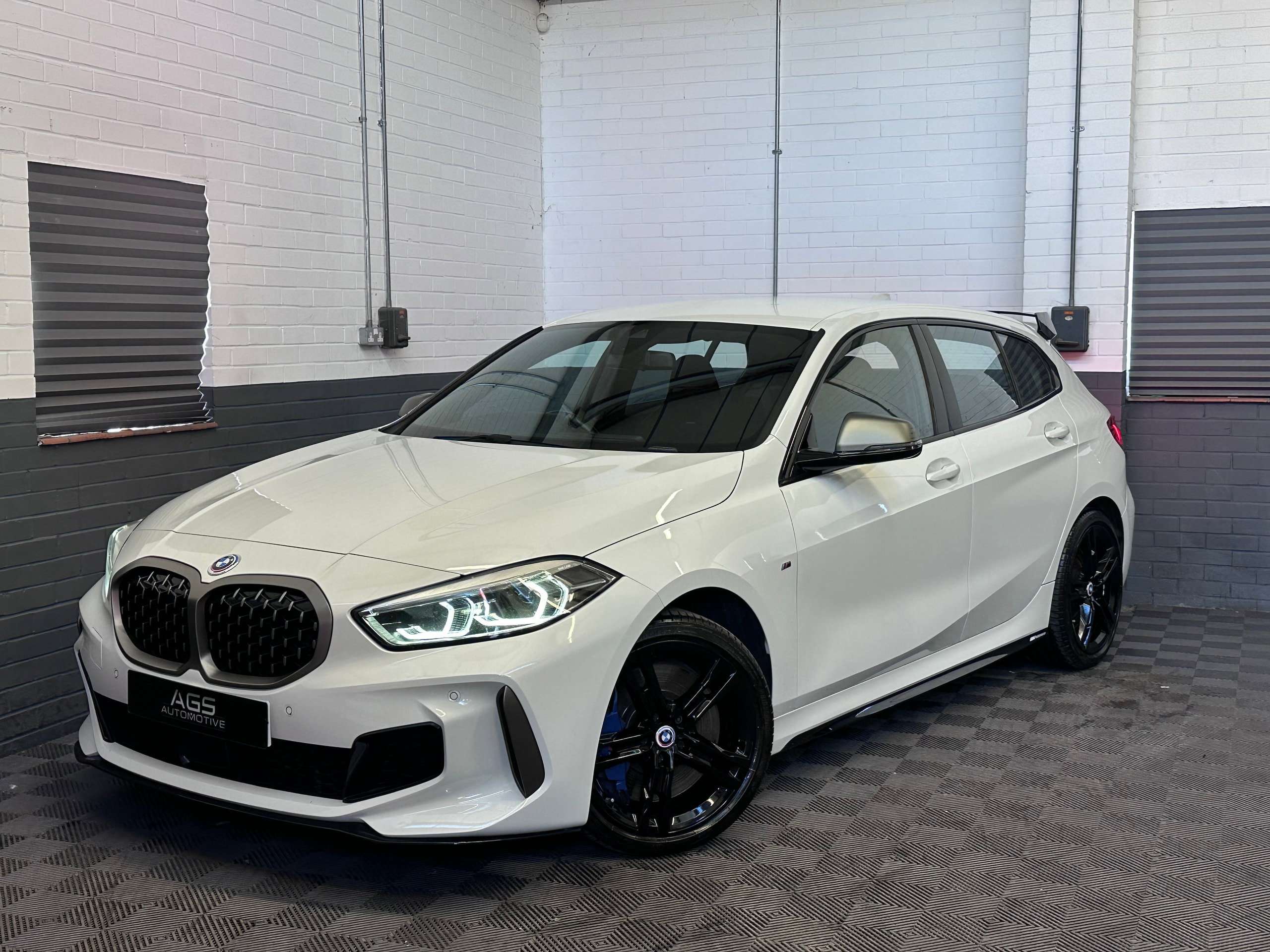 A 2021 BMW 1 SERIES 2.0 M135i Hatchback 5dr Petrol Auto xDrive Euro 6 (s/s) (306 ps) A 2021 BMW 1 SERIES 2.0 M135i Hatchback 5dr Petrol Auto xDrive Euro 6 (s/s) (306 ps)