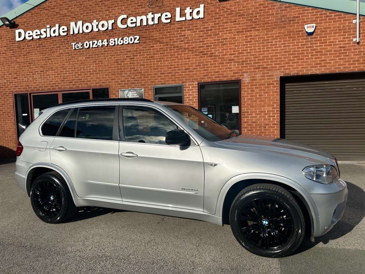 A 2012 BMW X5 3.0 30d M Sport SUV 5dr Diesel Steptronic xDrive Euro 5 (245 ps) Front and A 2012 BMW X5 3.0 30d M Sport SUV 5dr Diesel Steptronic xDrive Euro 5 (245 ps) Front and
