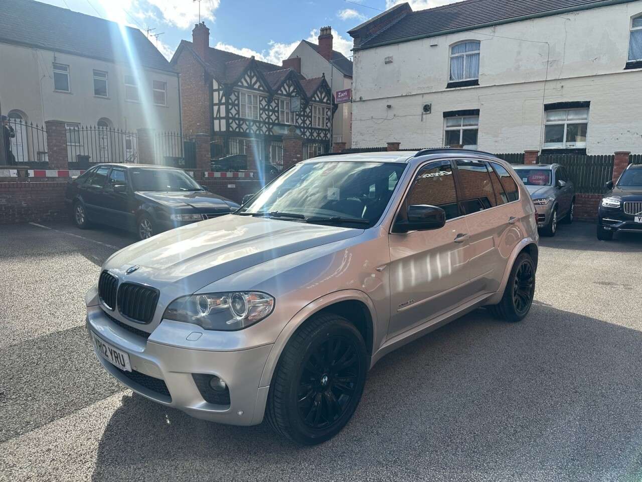 A 2012 BMW X5 3.0 30d M Sport SUV 5dr Diesel Steptronic xDrive Euro 5 (245 ps) Front and A 2012 BMW X5 3.0 30d M Sport SUV 5dr Diesel Steptronic xDrive Euro 5 (245 ps) Front and