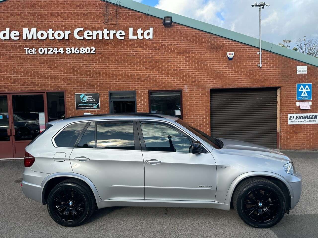 A 2012 BMW X5 3.0 30d M Sport SUV 5dr Diesel Steptronic xDrive Euro 5 (245 ps) Front and A 2012 BMW X5 3.0 30d M Sport SUV 5dr Diesel Steptronic xDrive Euro 5 (245 ps) Front and
