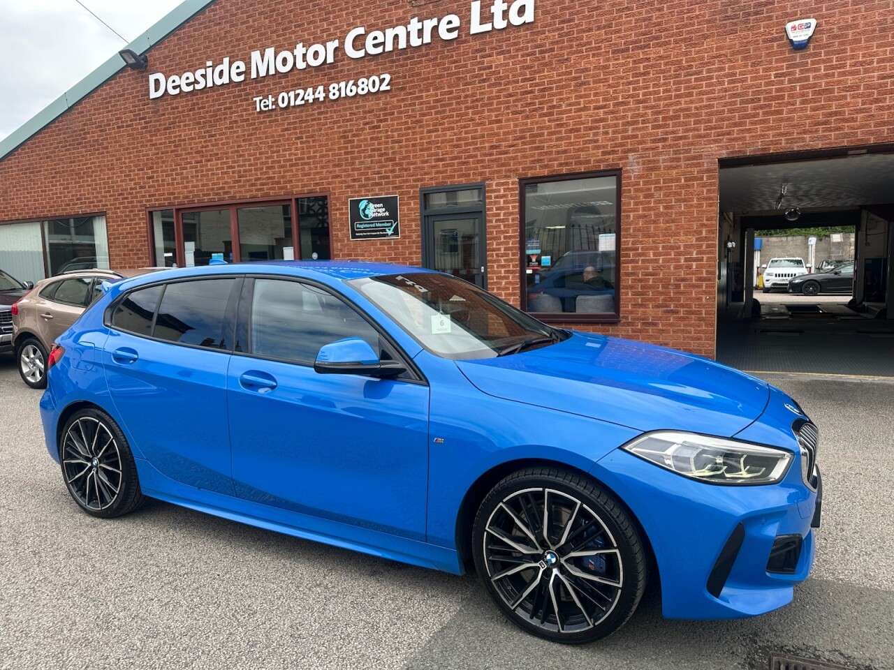 A 2021 BMW 1 SERIES 2.0 118d M Sport Hatchback 5dr Diesel Auto Euro 6 (s/s) (150 ps) Front and A 2021 BMW 1 SERIES 2.0 118d M Sport Hatchback 5dr Diesel Auto Euro 6 (s/s) (150 ps) Front and