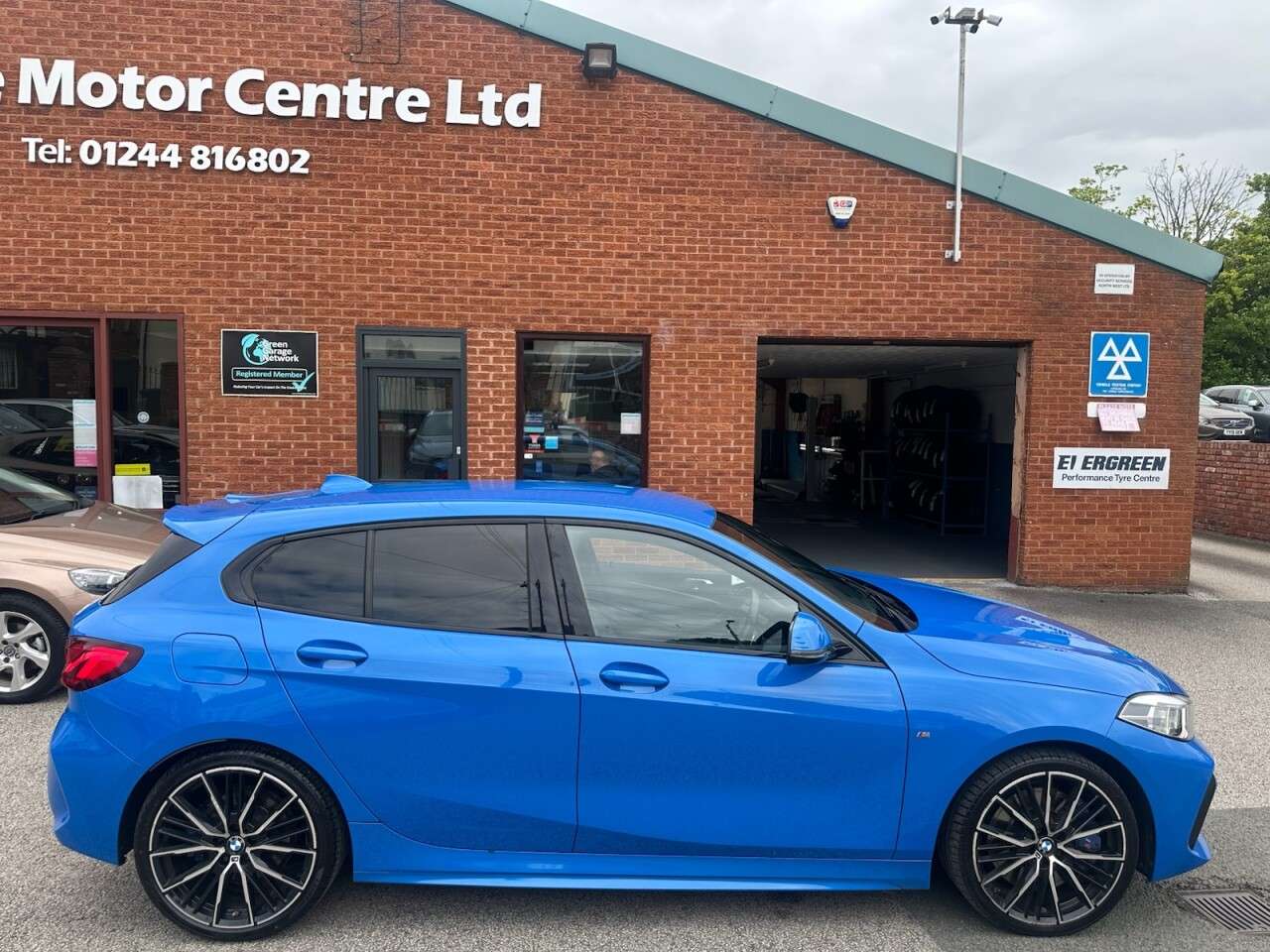 A 2021 BMW 1 SERIES 2.0 118d M Sport Hatchback 5dr Diesel Auto Euro 6 (s/s) (150 ps) Front and A 2021 BMW 1 SERIES 2.0 118d M Sport Hatchback 5dr Diesel Auto Euro 6 (s/s) (150 ps) Front and