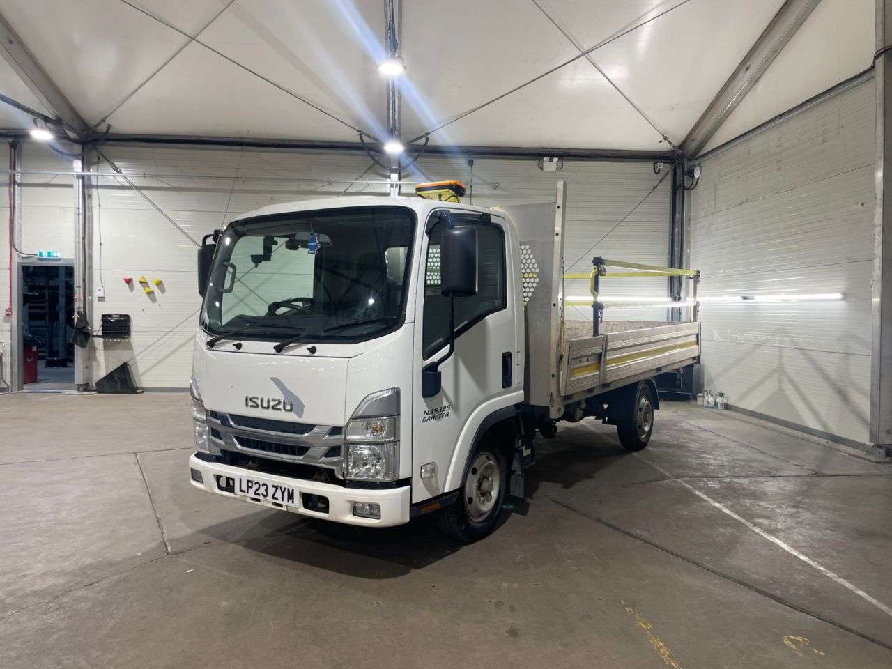 A 2023 ISUZU GRAFTER 1.9D N35 Green Dropside 2dr Diesel Manual RWD SWB Euro 6 (SRW) (125 ps) A 2023 ISUZU GRAFTER 1.9D N35 Green Dropside 2dr Diesel Manual RWD SWB Euro 6 (SRW) (125 ps)