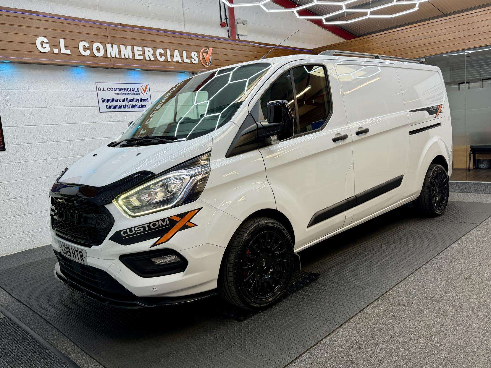 A 2019 FORD TRANSIT CUSTOM 2.0 320 EcoBlue Trend Panel Van 5dr Diesel Auto L2 H1 Euro 6 (s/s) (130 ps) A 2019 FORD TRANSIT CUSTOM 2.0 320 EcoBlue Trend Panel Van 5dr Diesel Auto L2 H1 Euro 6 (s/s) (130 ps)