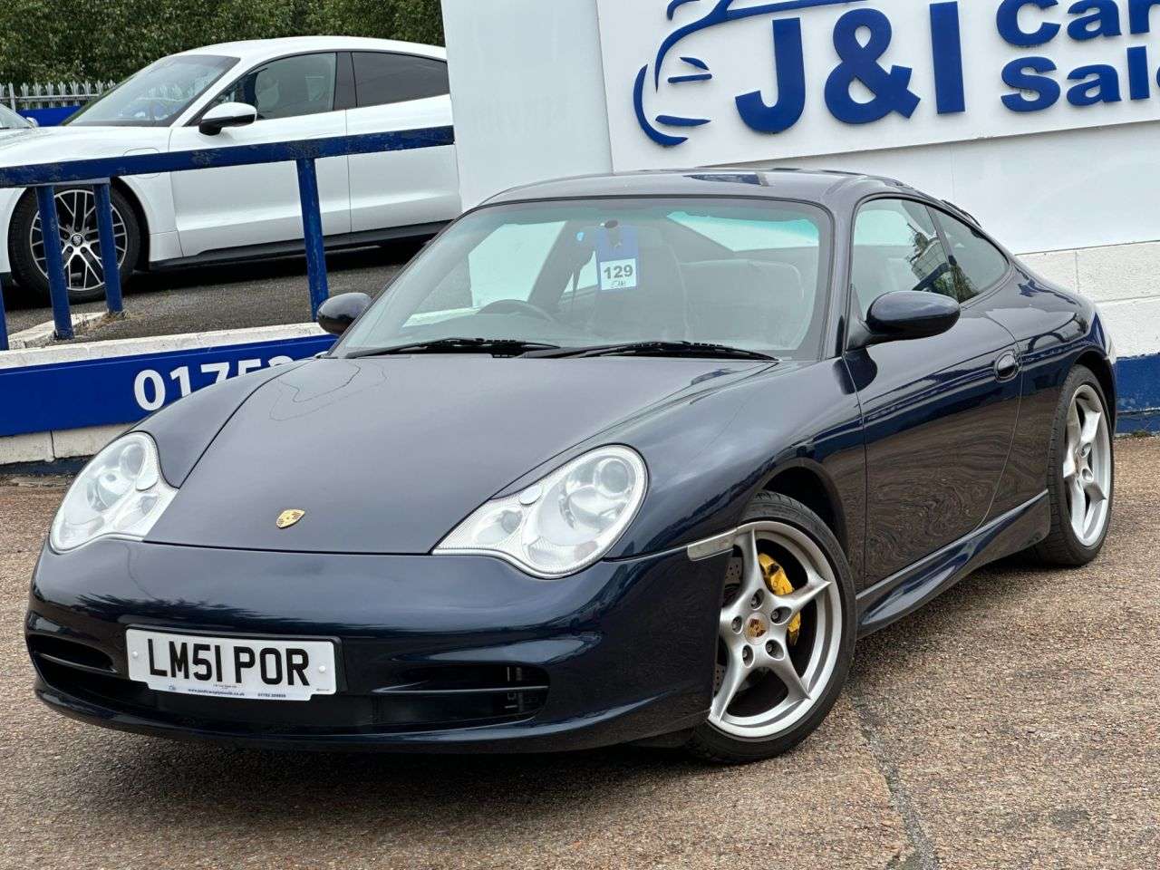 A 2002 PORSCHE 911 3.6 996 Carrera 4 Coupe 2dr Petrol Manual AWD (274 g/km, 315 bhp) GREAT SER A 2002 PORSCHE 911 3.6 996 Carrera 4 Coupe 2dr Petrol Manual AWD (274 g/km, 315 bhp) GREAT SER