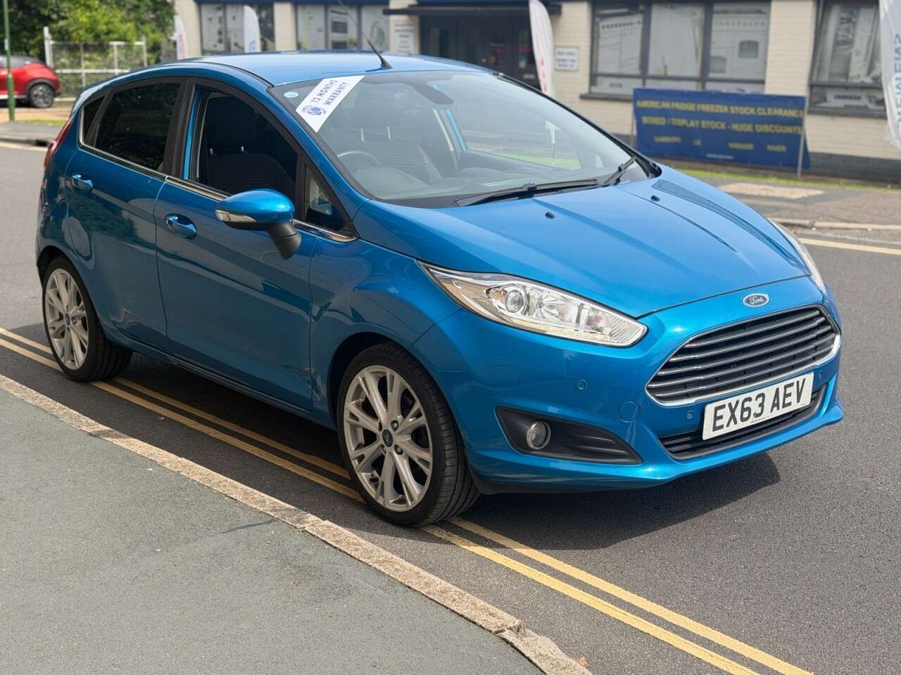 A 2013 FORD FIESTA 1.0T EcoBoost Titanium Hatchback 5dr Petrol Manual Euro 5 (s/s) (100 ps) A 2013 FORD FIESTA 1.0T EcoBoost Titanium Hatchback 5dr Petrol Manual Euro 5 (s/s) (100 ps)