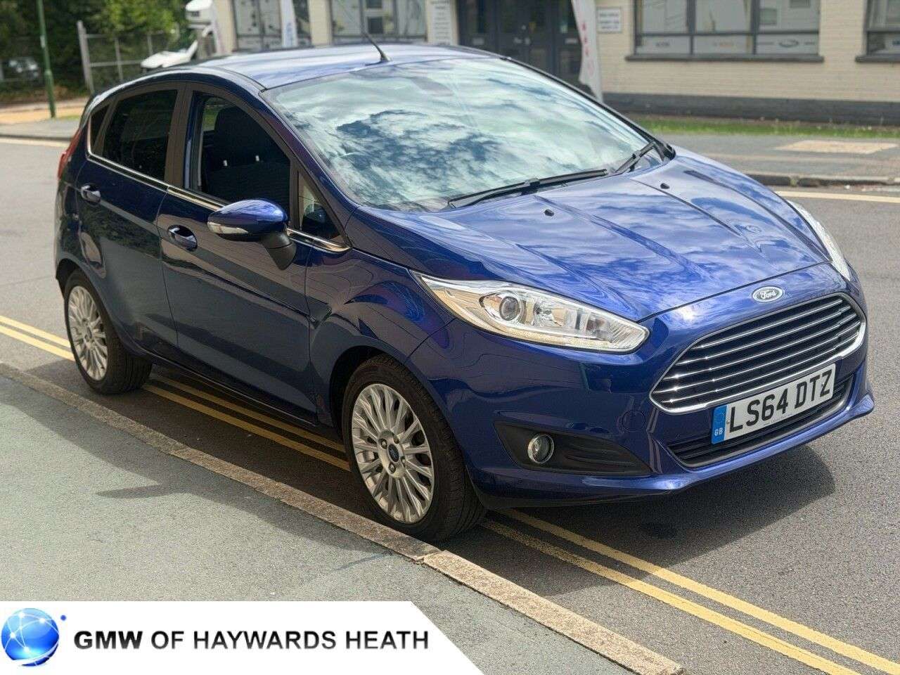 A 2014 FORD FIESTA 1.0T EcoBoost Titanium Hatchback 5dr Petrol Manual Euro 5 (s/s) (100 ps) A 2014 FORD FIESTA 1.0T EcoBoost Titanium Hatchback 5dr Petrol Manual Euro 5 (s/s) (100 ps)