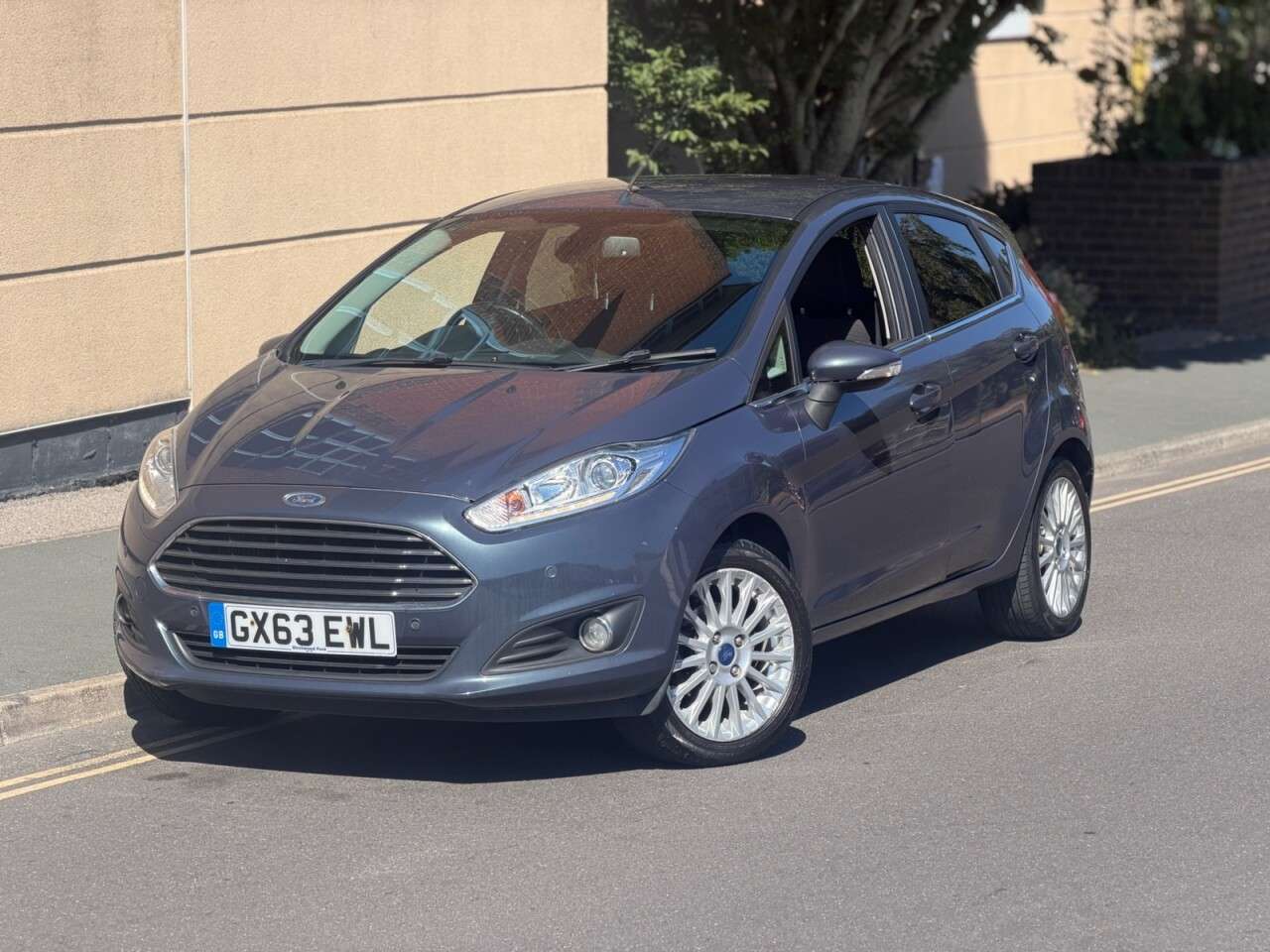 A 2013 FORD FIESTA 1.0T EcoBoost Titanium Hatchback 5dr Petrol Manual Euro 5 (s/s) (125 ps) A 2013 FORD FIESTA 1.0T EcoBoost Titanium Hatchback 5dr Petrol Manual Euro 5 (s/s) (125 ps)