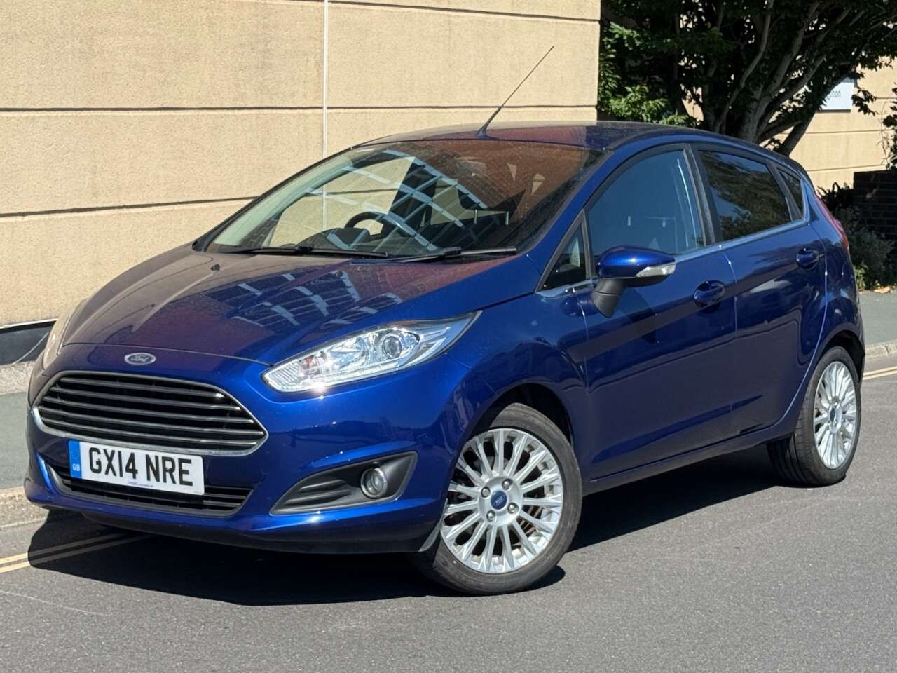 A 2014 FORD FIESTA 1.0T EcoBoost Titanium Hatchback 5dr Petrol Manual Euro 5 (s/s) (100 ps) A 2014 FORD FIESTA 1.0T EcoBoost Titanium Hatchback 5dr Petrol Manual Euro 5 (s/s) (100 ps)