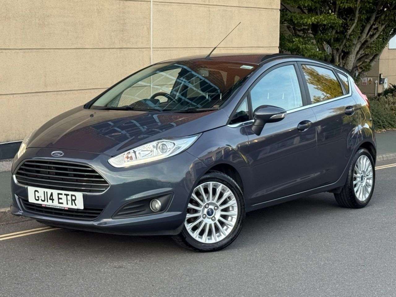 A 2014 FORD FIESTA 1.0T EcoBoost Titanium Hatchback 5dr Petrol Manual Euro 5 (s/s) (125 ps) A 2014 FORD FIESTA 1.0T EcoBoost Titanium Hatchback 5dr Petrol Manual Euro 5 (s/s) (125 ps)
