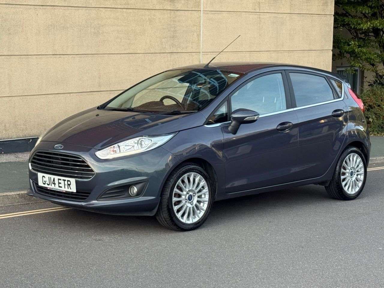 A 2014 FORD FIESTA 1.0T EcoBoost Titanium Hatchback 5dr Petrol Manual Euro 5 (s/s) (125 ps) A 2014 FORD FIESTA 1.0T EcoBoost Titanium Hatchback 5dr Petrol Manual Euro 5 (s/s) (125 ps)