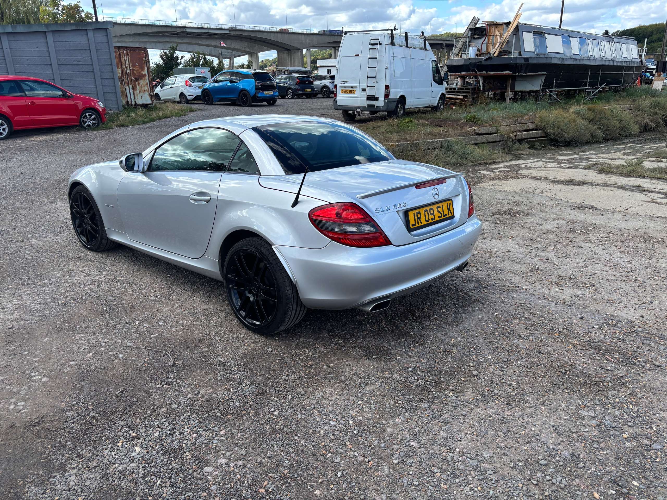 A 2009 MERCEDES-BENZ SLK 1.8 SLK200K Convertible 2dr Petrol Tiptronic Euro 4 (184 ps) A 2009 MERCEDES-BENZ SLK 1.8 SLK200K Convertible 2dr Petrol Tiptronic Euro 4 (184 ps)