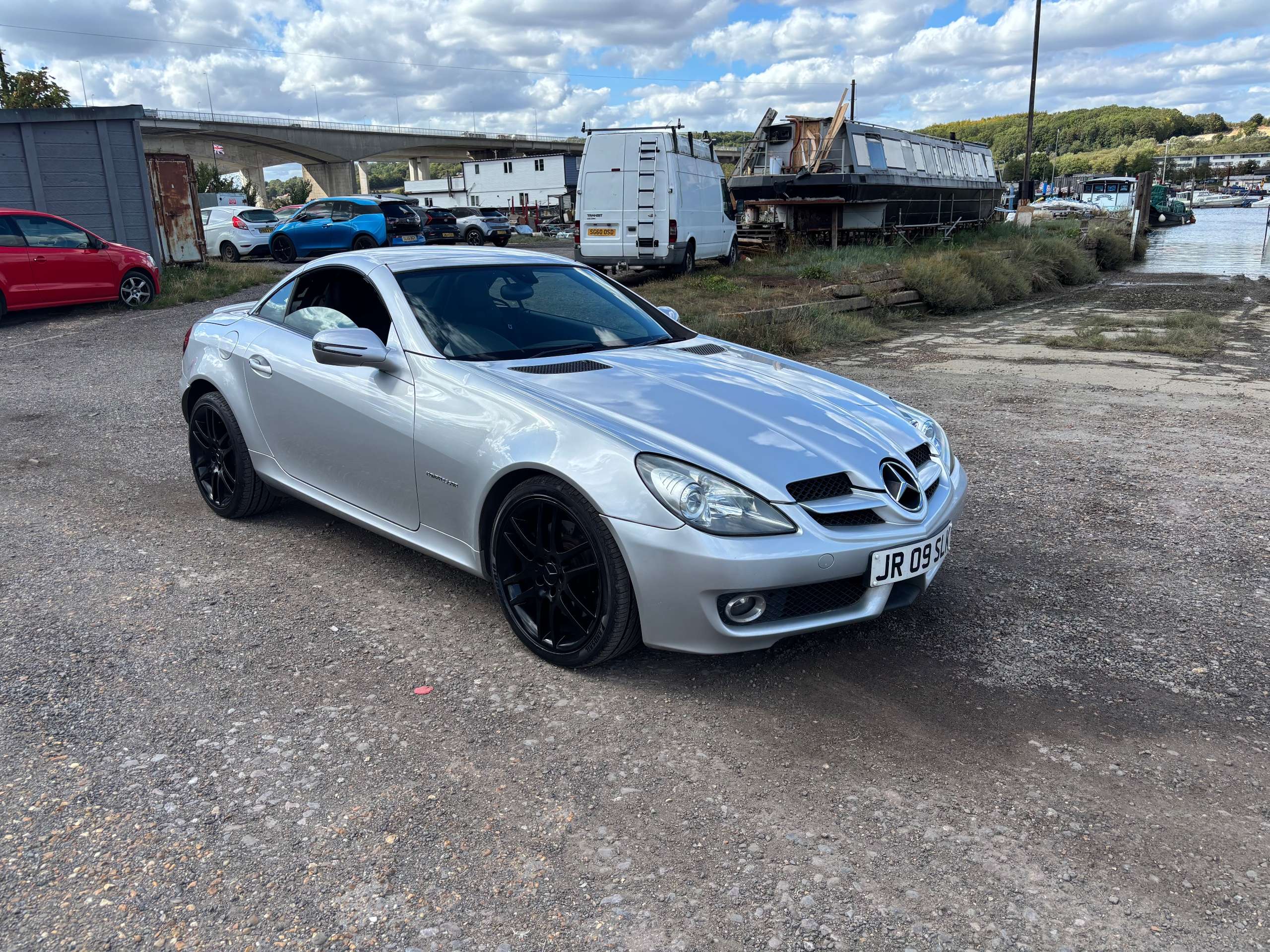 A 2009 MERCEDES-BENZ SLK 1.8 SLK200K Convertible 2dr Petrol Tiptronic Euro 4 (184 ps) A 2009 MERCEDES-BENZ SLK 1.8 SLK200K Convertible 2dr Petrol Tiptronic Euro 4 (184 ps)