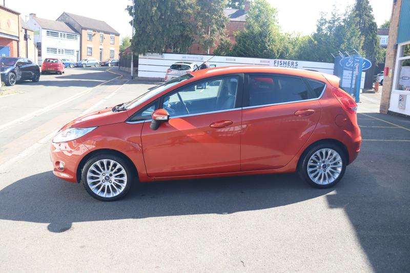 A 2012 FORD FIESTA 1.4 Titanium Hatchback 5dr Petrol Automatic (154 g/km, 94 bhp) A 2012 FORD FIESTA 1.4 Titanium Hatchback 5dr Petrol Automatic (154 g/km, 94 bhp)