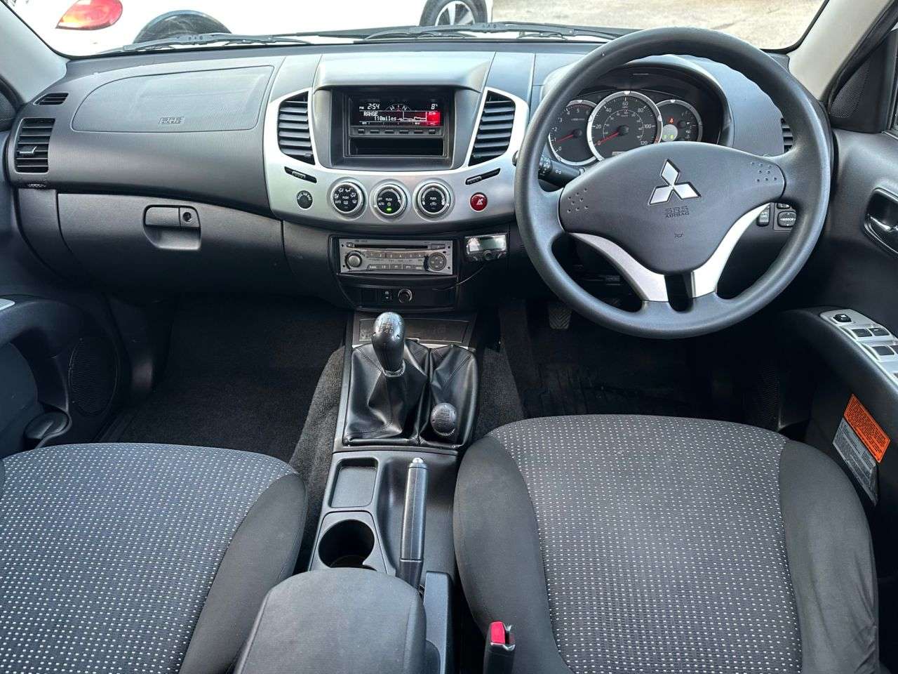 A 2014 MITSUBISHI L200 2.5 DI-D Trojan Pickup Double Cab 4dr Diesel Manual 4WD Euro 5 (175 ps) A 2014 MITSUBISHI L200 2.5 DI-D Trojan Pickup Double Cab 4dr Diesel Manual 4WD Euro 5 (175 ps)