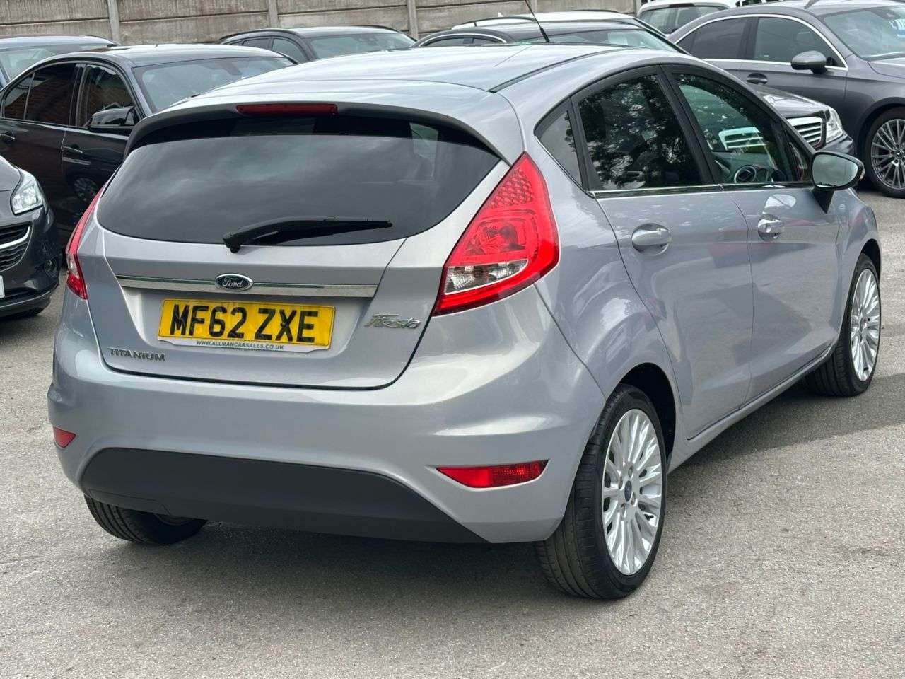 A 2012 FORD FIESTA 1.4 Titanium Hatchback 5dr Petrol Manual (130 g/km, 94 bhp) A 2012 FORD FIESTA 1.4 Titanium Hatchback 5dr Petrol Manual (130 g/km, 94 bhp)