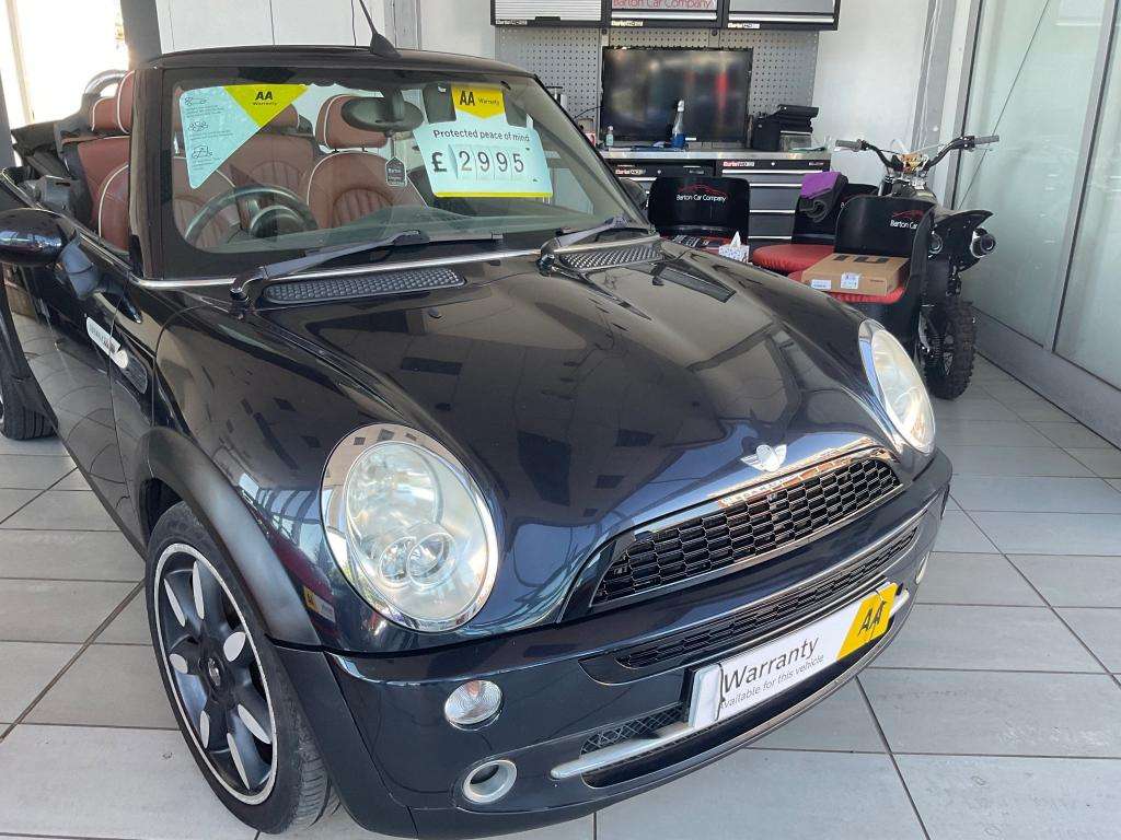 A 2008 MINI CONVERTIBLE One Sidewalk A 2008 MINI CONVERTIBLE One Sidewalk