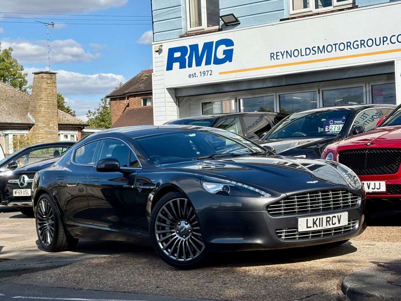 A 2011 ASTON MARTIN RAPIDE 6.0 V12 Saloon 4dr Petrol T-TronicII Euro 5 (470 bhp) | HEATED AND COOLED F A 2011 ASTON MARTIN RAPIDE 6.0 V12 Saloon 4dr Petrol T-TronicII Euro 5 (470 bhp) | HEATED AND COOLED F