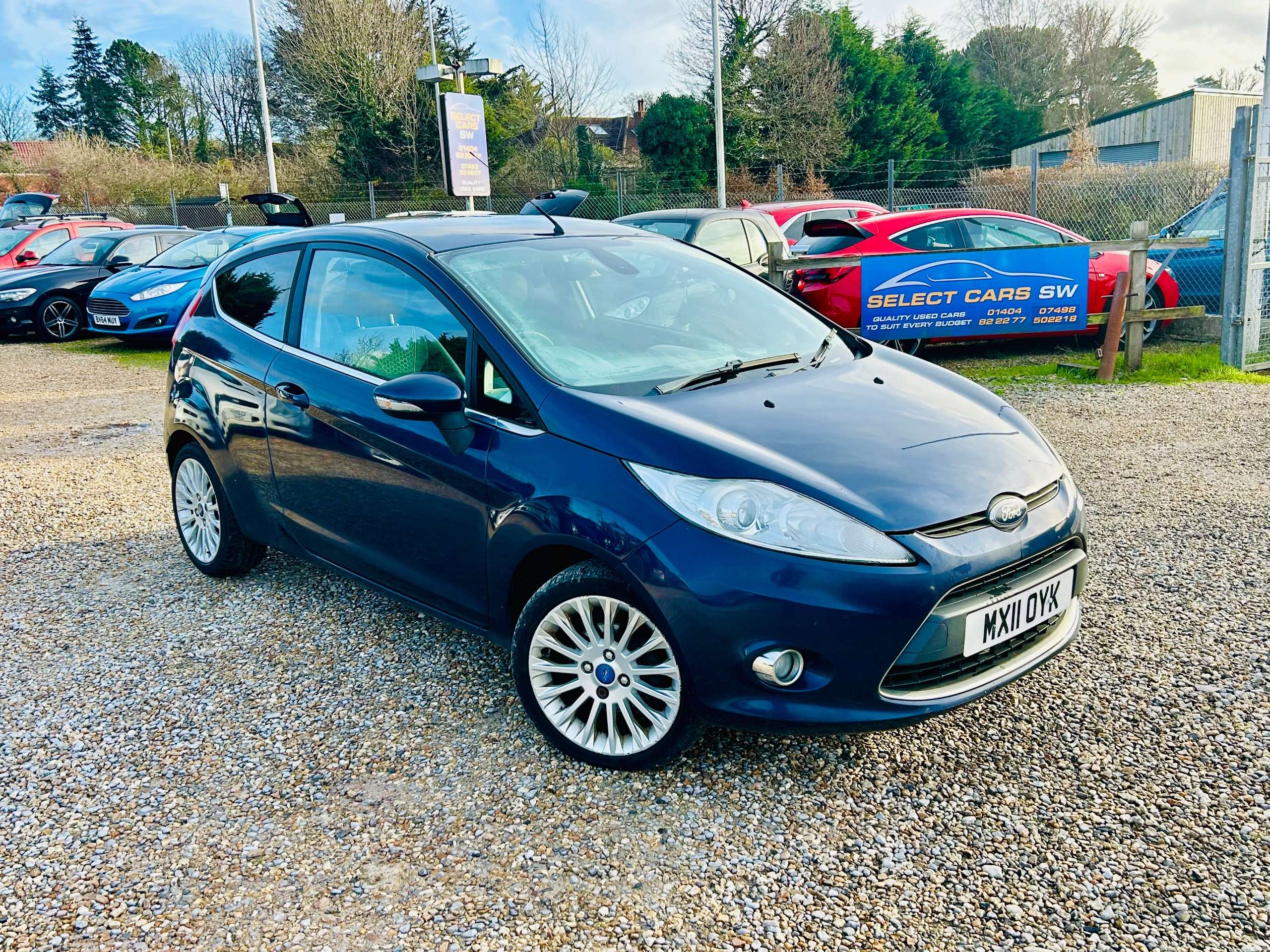 A 2011 FORD FIESTA 1.4 Titanium Hatchback 3dr Petrol Manual (133 g/km, 94 bhp) A 2011 FORD FIESTA 1.4 Titanium Hatchback 3dr Petrol Manual (133 g/km, 94 bhp)