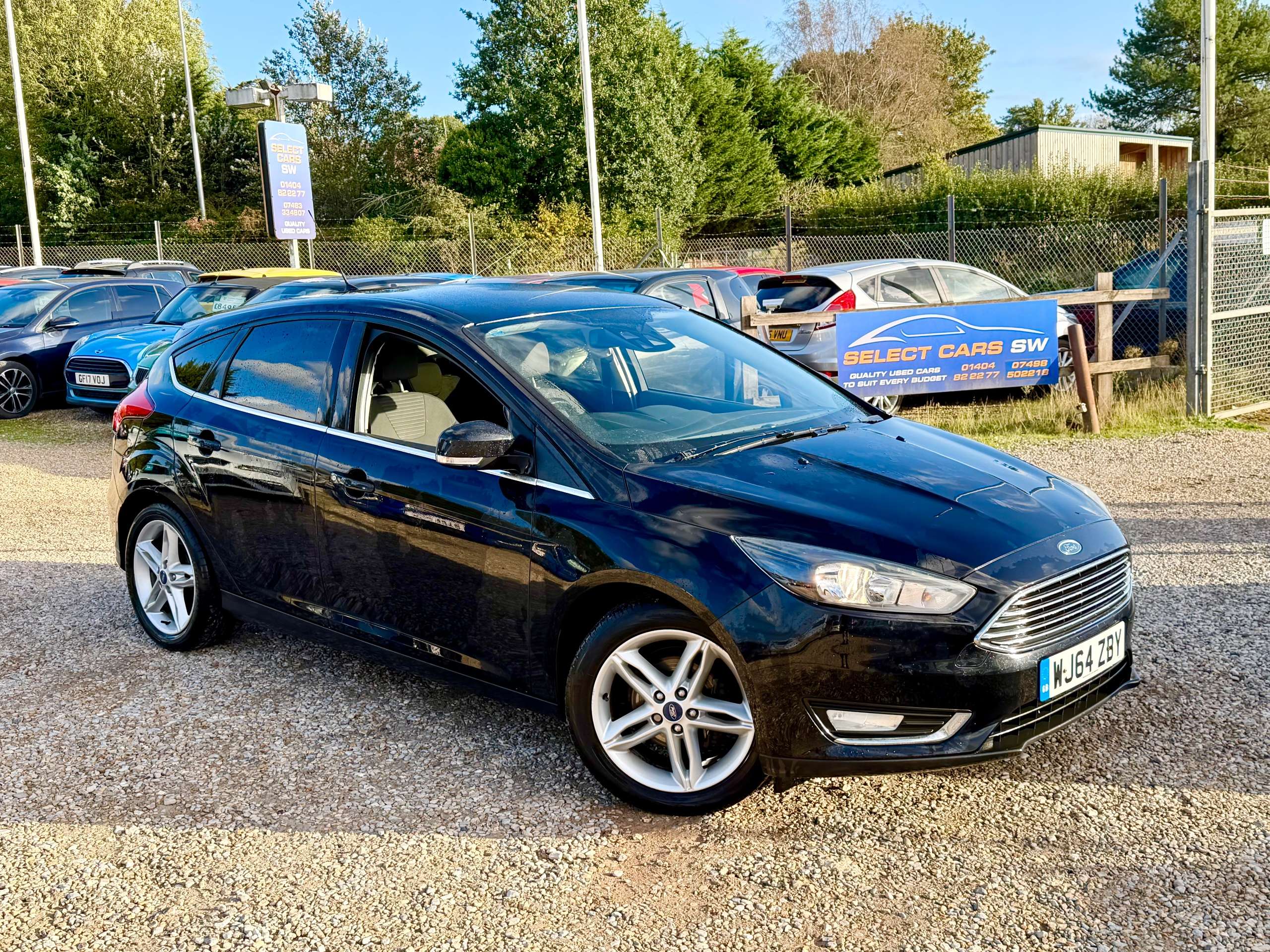 A 2014 FORD FOCUS 1.0T EcoBoost Titanium Hatchback 5dr Petrol Manual Euro 6 (s/s) (125 ps) A 2014 FORD FOCUS 1.0T EcoBoost Titanium Hatchback 5dr Petrol Manual Euro 6 (s/s) (125 ps)