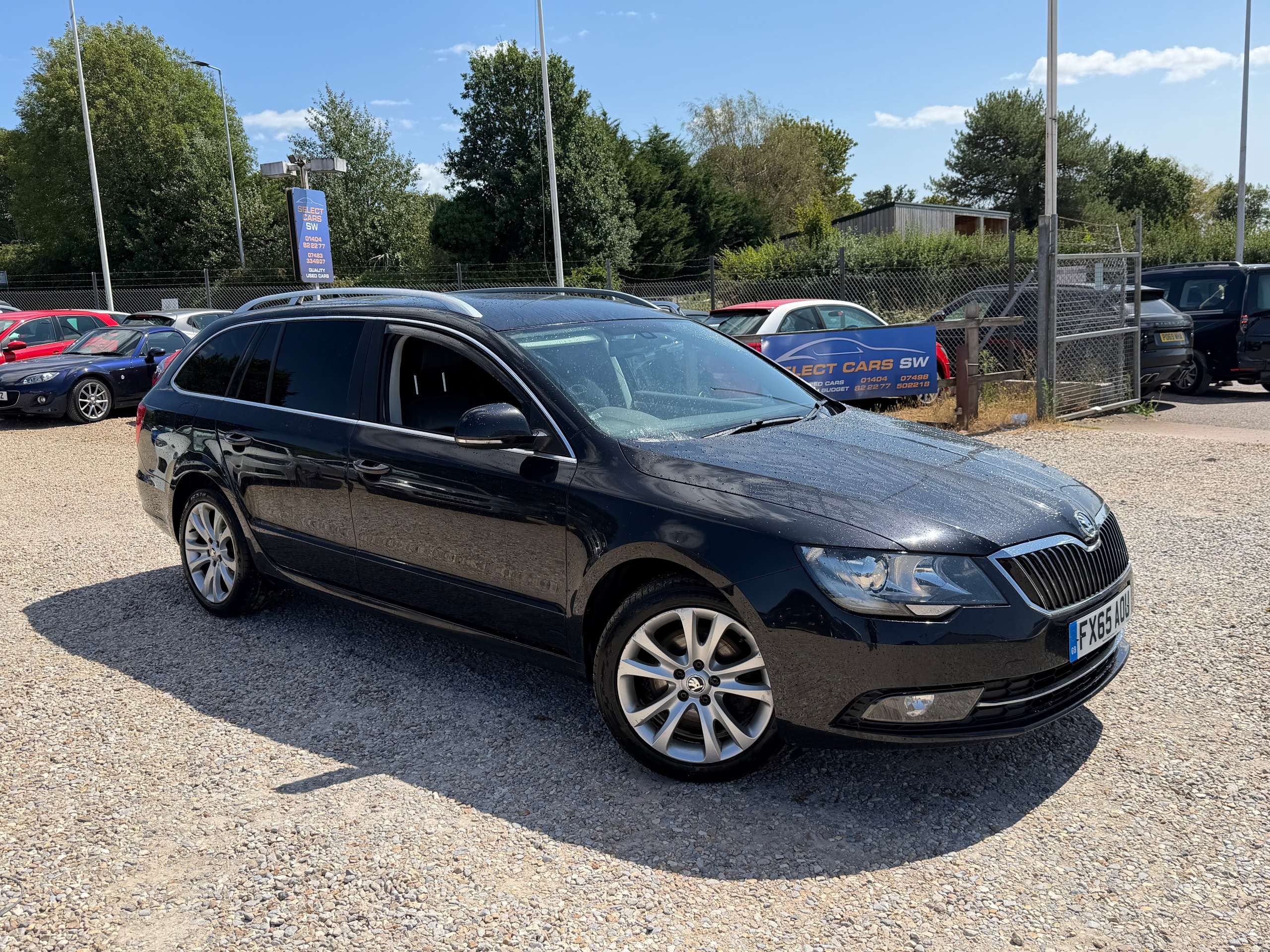 A 2015 SKODA SUPERB 2.0 TDI SE Business Estate 5dr Diesel Manual Euro 5 (s/s) (Leather) (140 ps) A 2015 SKODA SUPERB 2.0 TDI SE Business Estate 5dr Diesel Manual Euro 5 (s/s) (Leather) (140 ps)