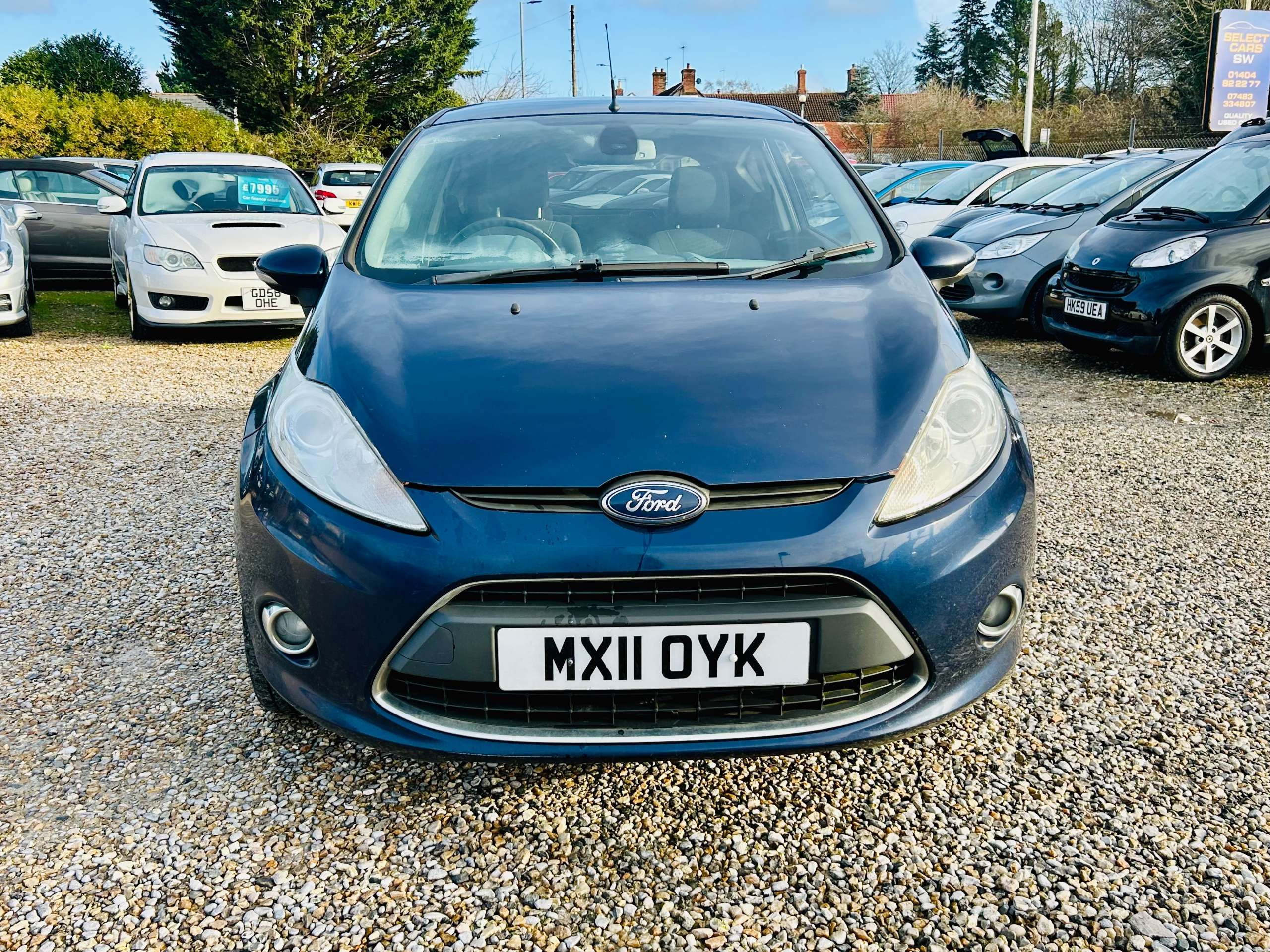 A 2011 FORD FIESTA 1.4 Titanium Hatchback 3dr Petrol Manual (133 g/km, 94 bhp) A 2011 FORD FIESTA 1.4 Titanium Hatchback 3dr Petrol Manual (133 g/km, 94 bhp)