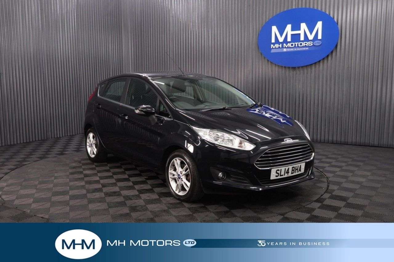 A 2014 FORD FIESTA 1.5 TDCi Zetec Hatchback 5dr Diesel Manual Euro 5 (75 ps) LONG MOT / LOW IN A 2014 FORD FIESTA 1.5 TDCi Zetec Hatchback 5dr Diesel Manual Euro 5 (75 ps) LONG MOT / LOW IN