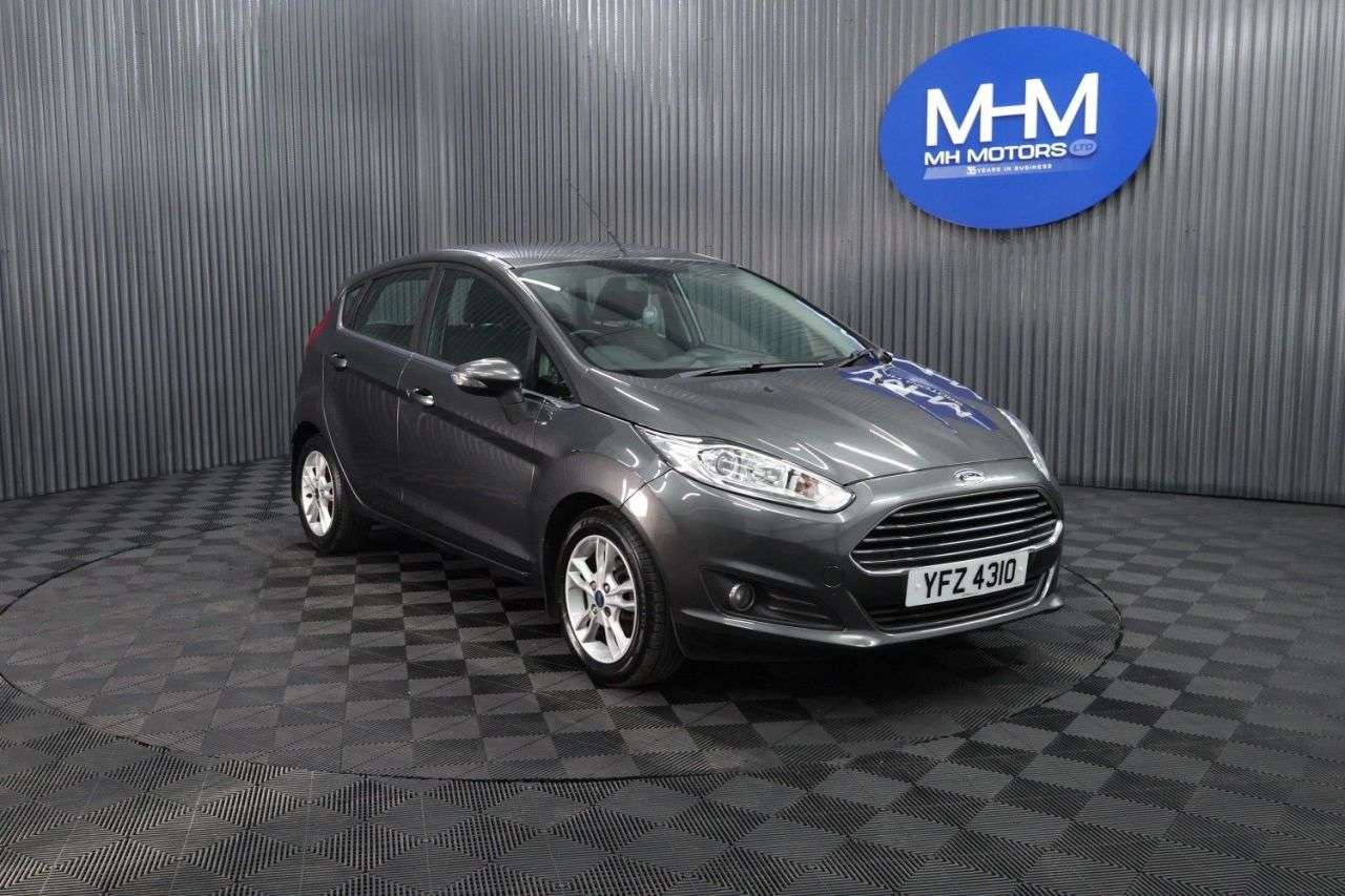 A 2015 FORD FIESTA 1.25 Zetec Hatchback 5dr Petrol Manual Euro 6 (82 ps) LOW INSURANCE GROUP 7 A 2015 FORD FIESTA 1.25 Zetec Hatchback 5dr Petrol Manual Euro 6 (82 ps) LOW INSURANCE GROUP 7