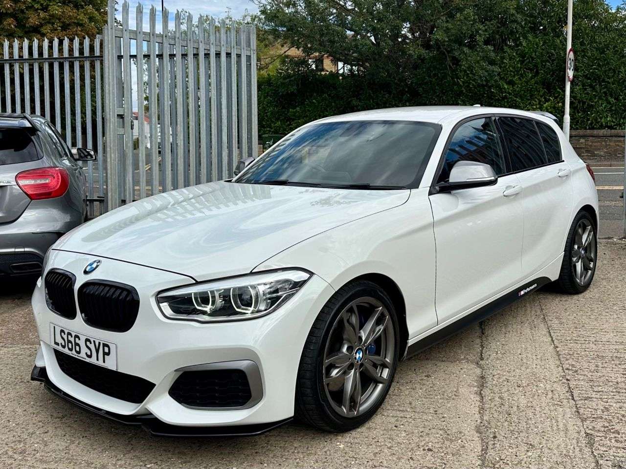 A 2016 BMW 1 SERIES 3.0 M140i Hatchback 5dr Petrol Auto Euro 6 (s/s) (340 ps) A 2016 BMW 1 SERIES 3.0 M140i Hatchback 5dr Petrol Auto Euro 6 (s/s) (340 ps)