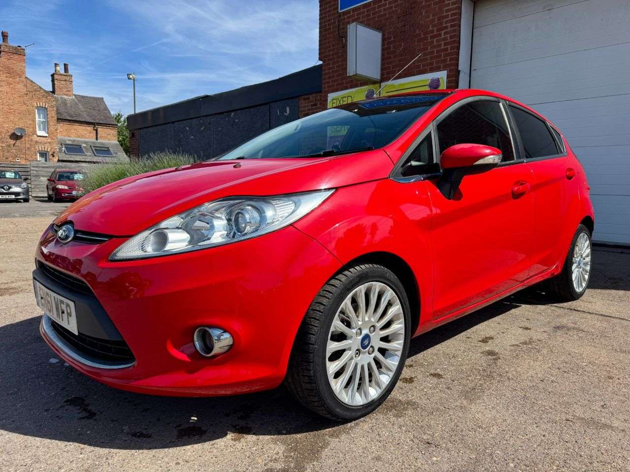 A 2012 FORD FIESTA 1.4 TDCi DPF Titanium Hatchback 5dr Diesel Manual (107 g/km, 69 bhp) A 2012 FORD FIESTA 1.4 TDCi DPF Titanium Hatchback 5dr Diesel Manual (107 g/km, 69 bhp)