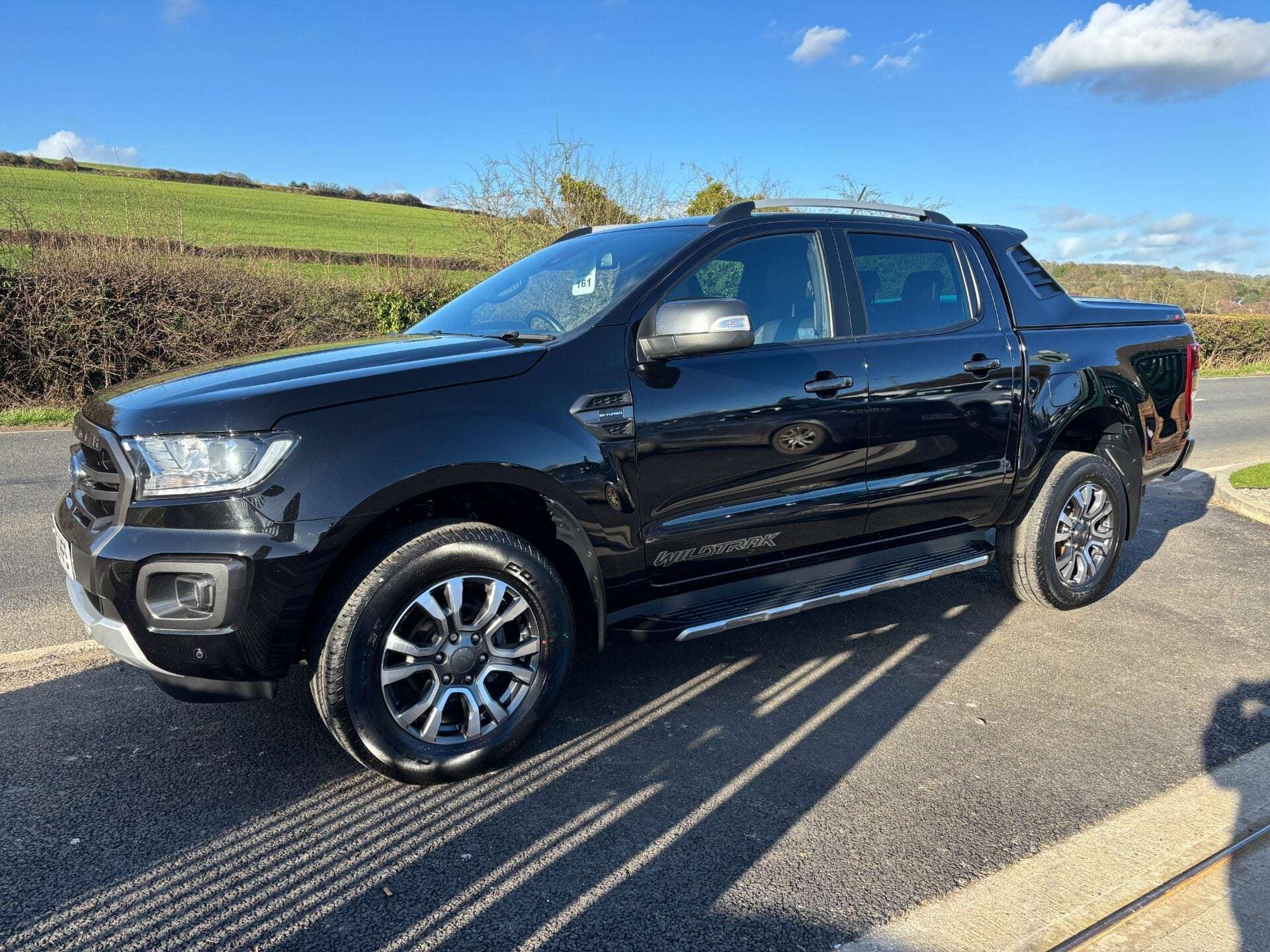 A 2022 FORD RANGER Wildtrak 213 ps 4x4 Double Cab Pickup - Tonneau Cover A 2022 FORD RANGER Wildtrak 213 ps 4x4 Double Cab Pickup - Tonneau Cover